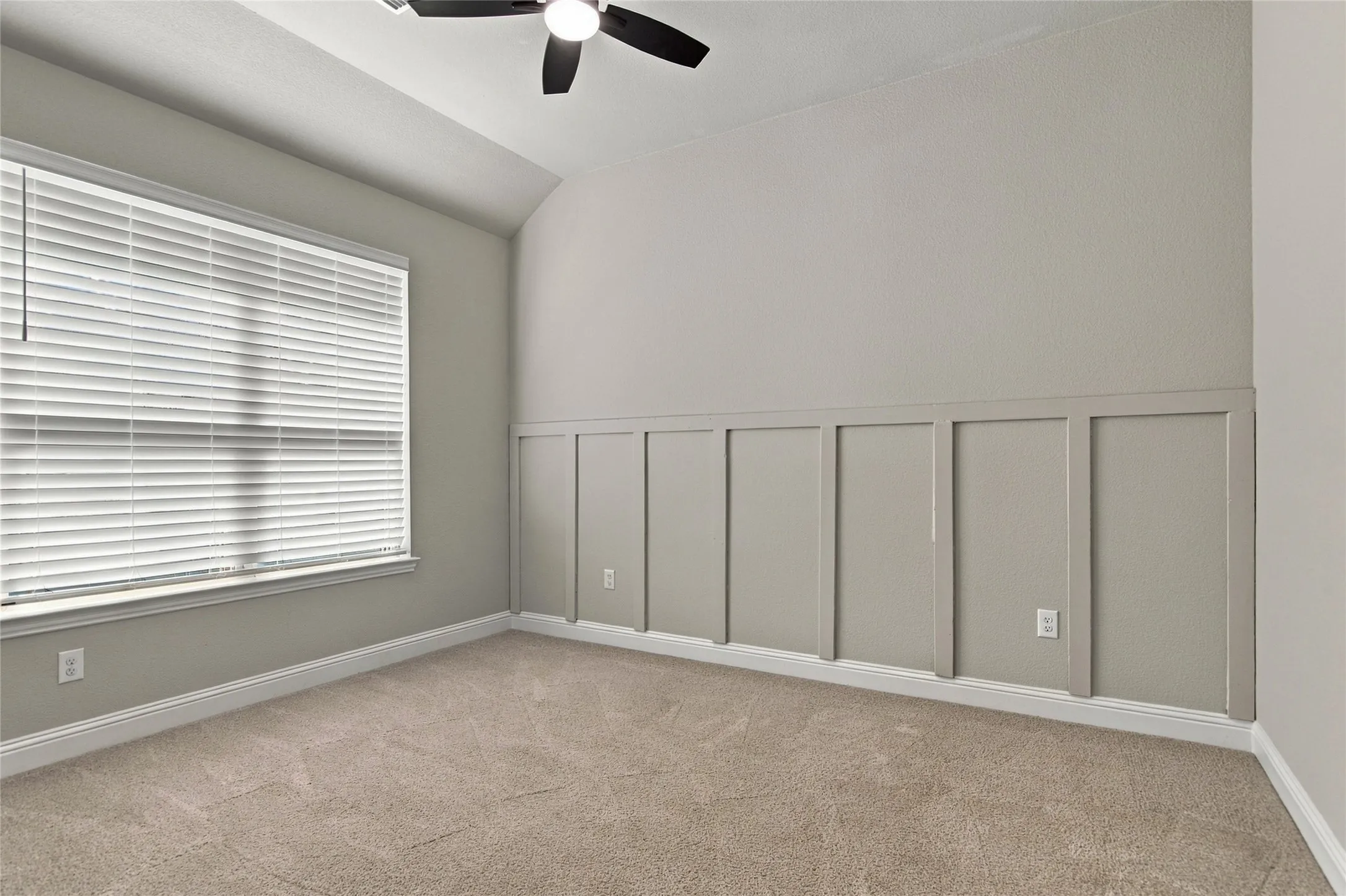 Oversized Bedroom 3 adorned with wainscoting and walkin closet