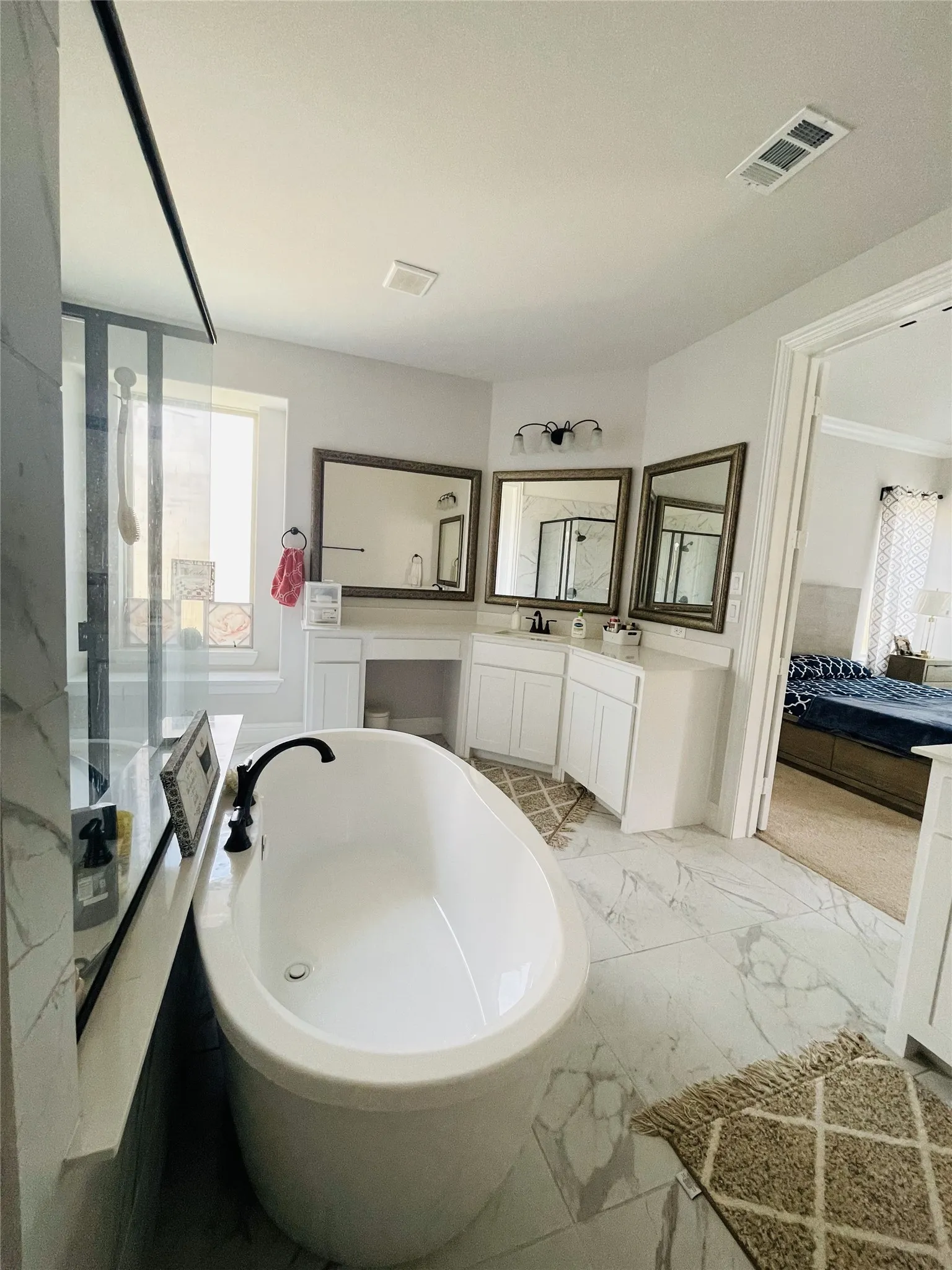 Bathroom featuring vanity and a bathtub