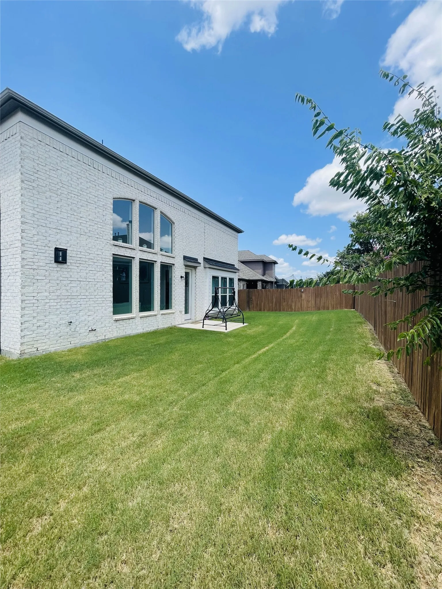 View of yard with a patio