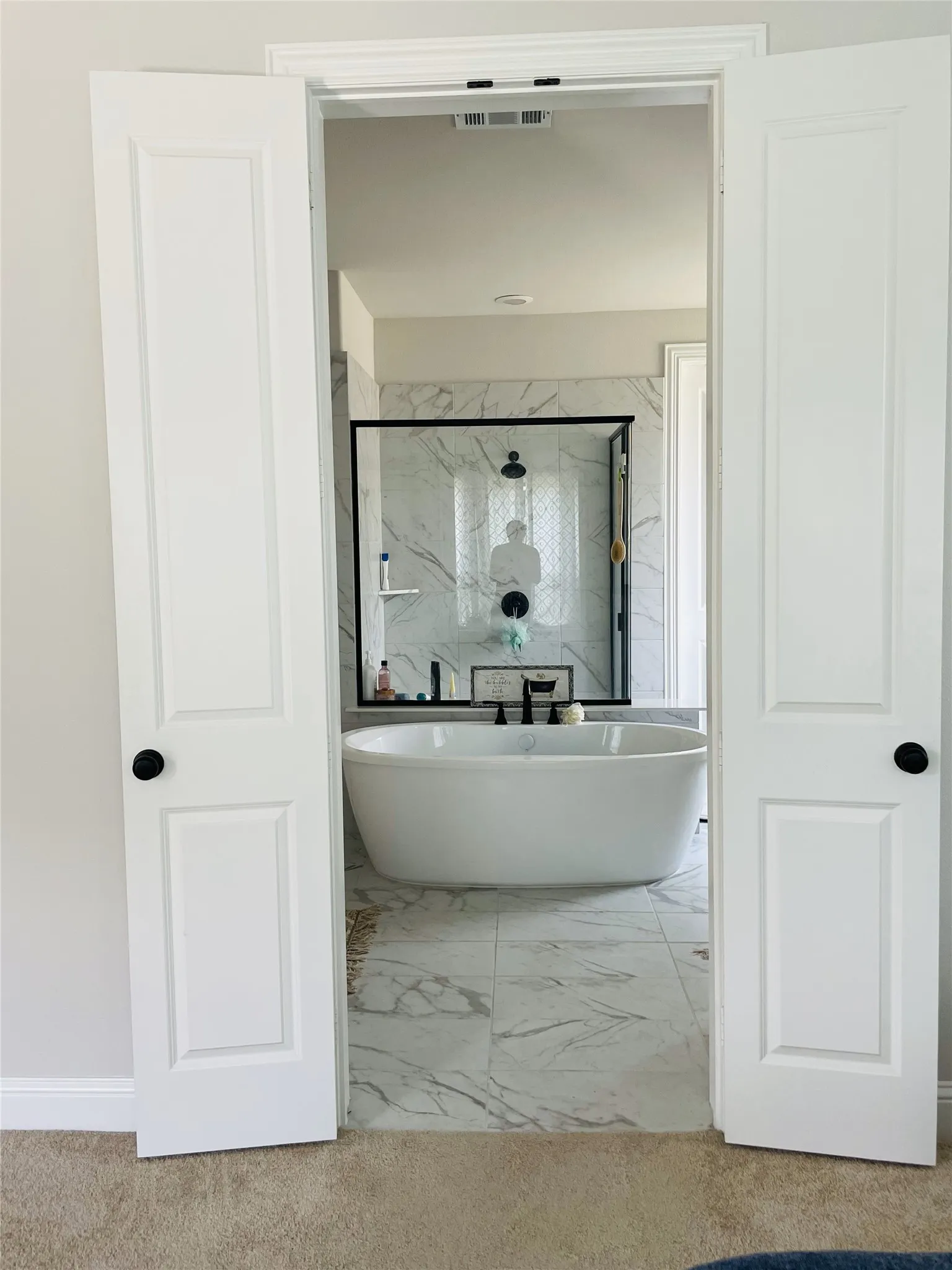 Bathroom featuring independent shower and bath