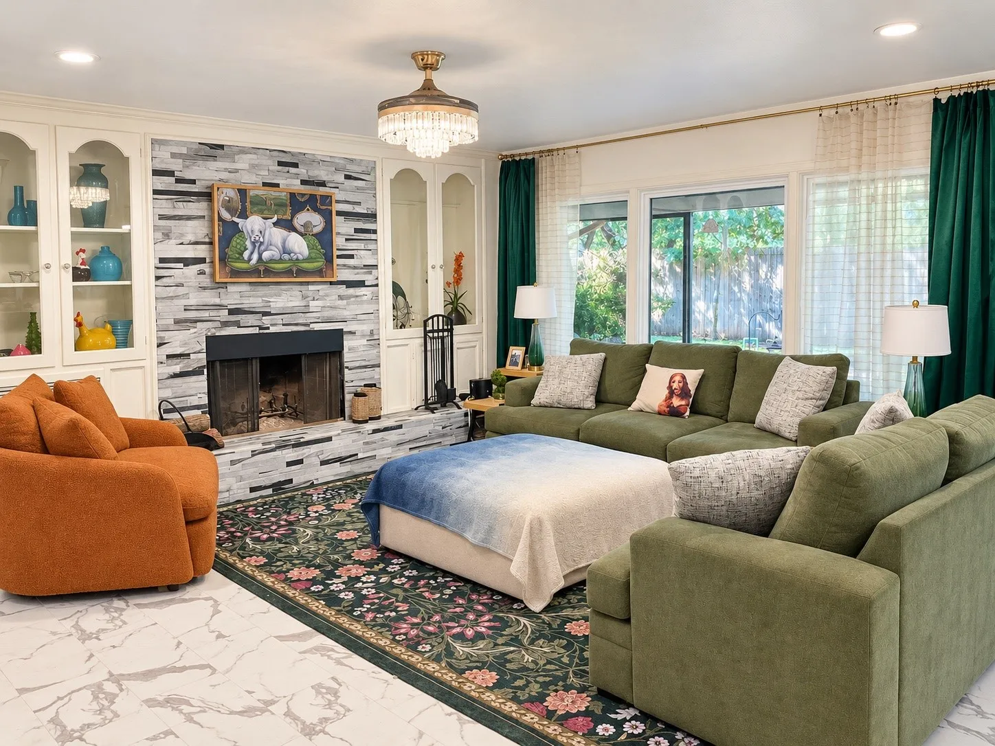 Fireplace with stacked stone surround, built-in cabinetry with glass-front uppers, brass chandelier, large windows, and marble-patterned flooring