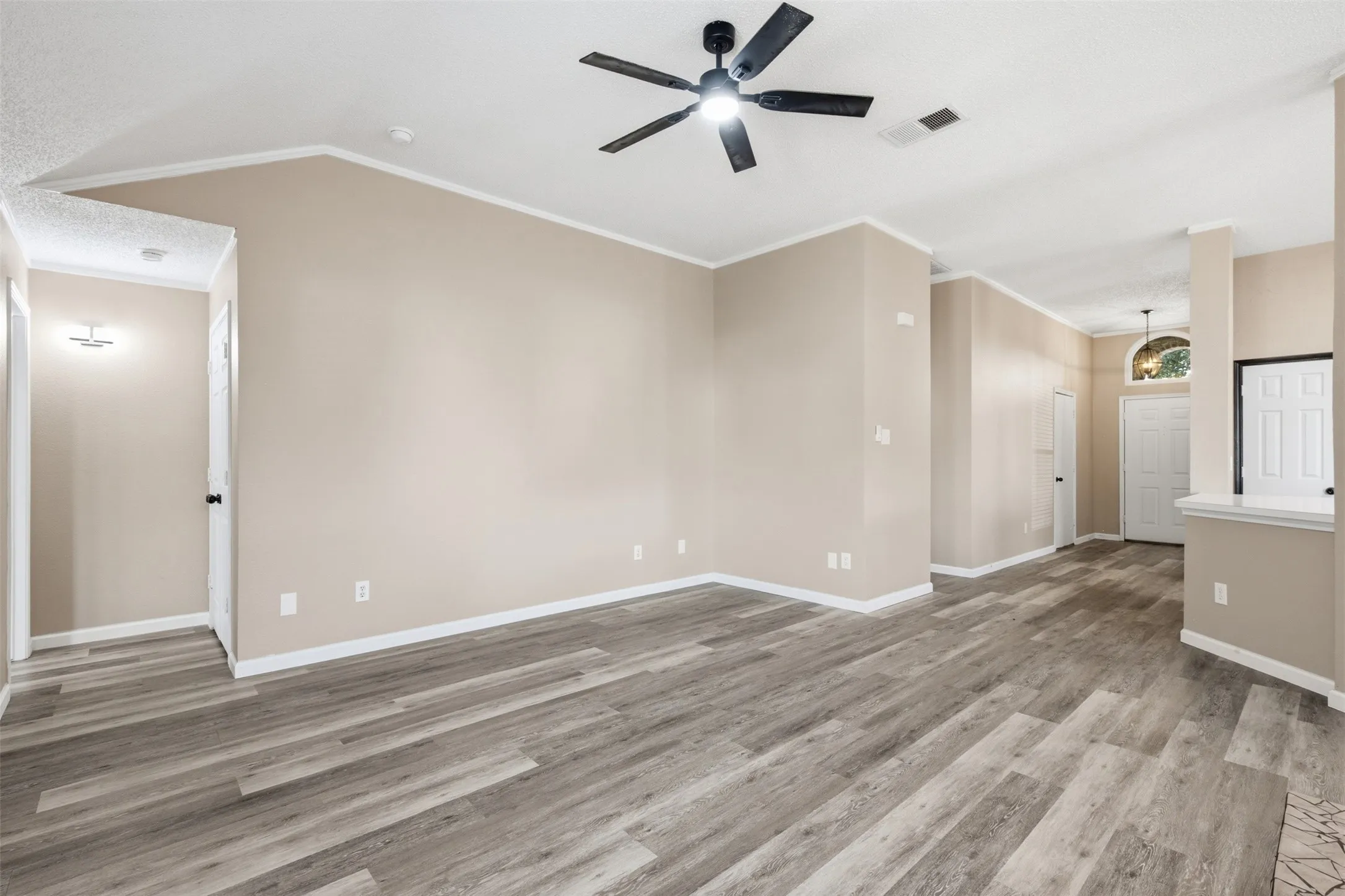 ENTRY LEADS TO OPEN FLOOR PLAN
