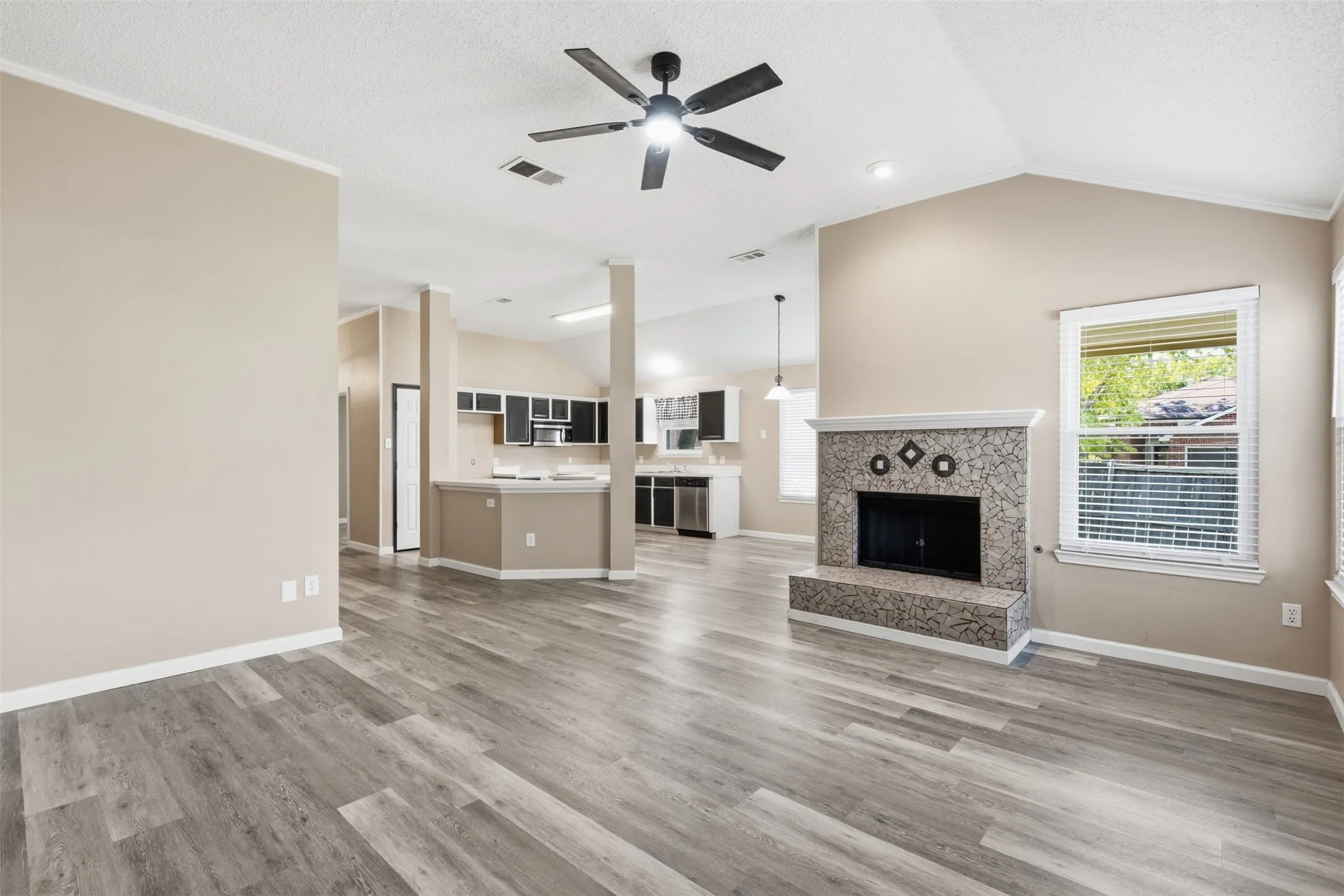 KITCHEN OPENS TO FAMILY ROOM