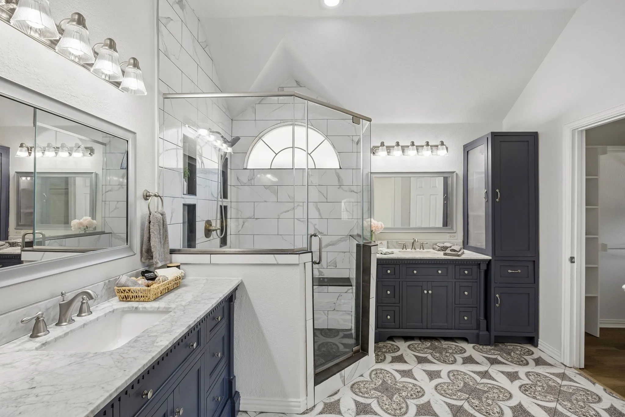 Indulge in this spa-inspired, beautifully updated master retreat!  Dual vanities, substantial and eloquent shower, and lovely lighting, provide the perfect place to relax at the end of the day!