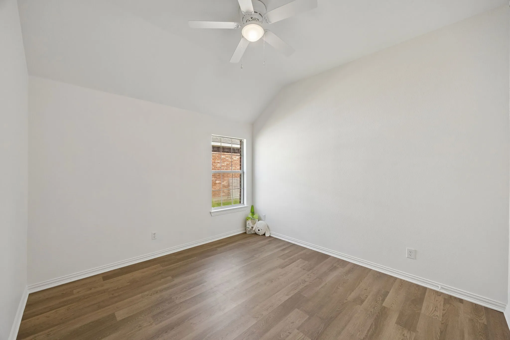 The secondary bedrooms are spacious as well!  Attractive warm flooring flows throughout the home!