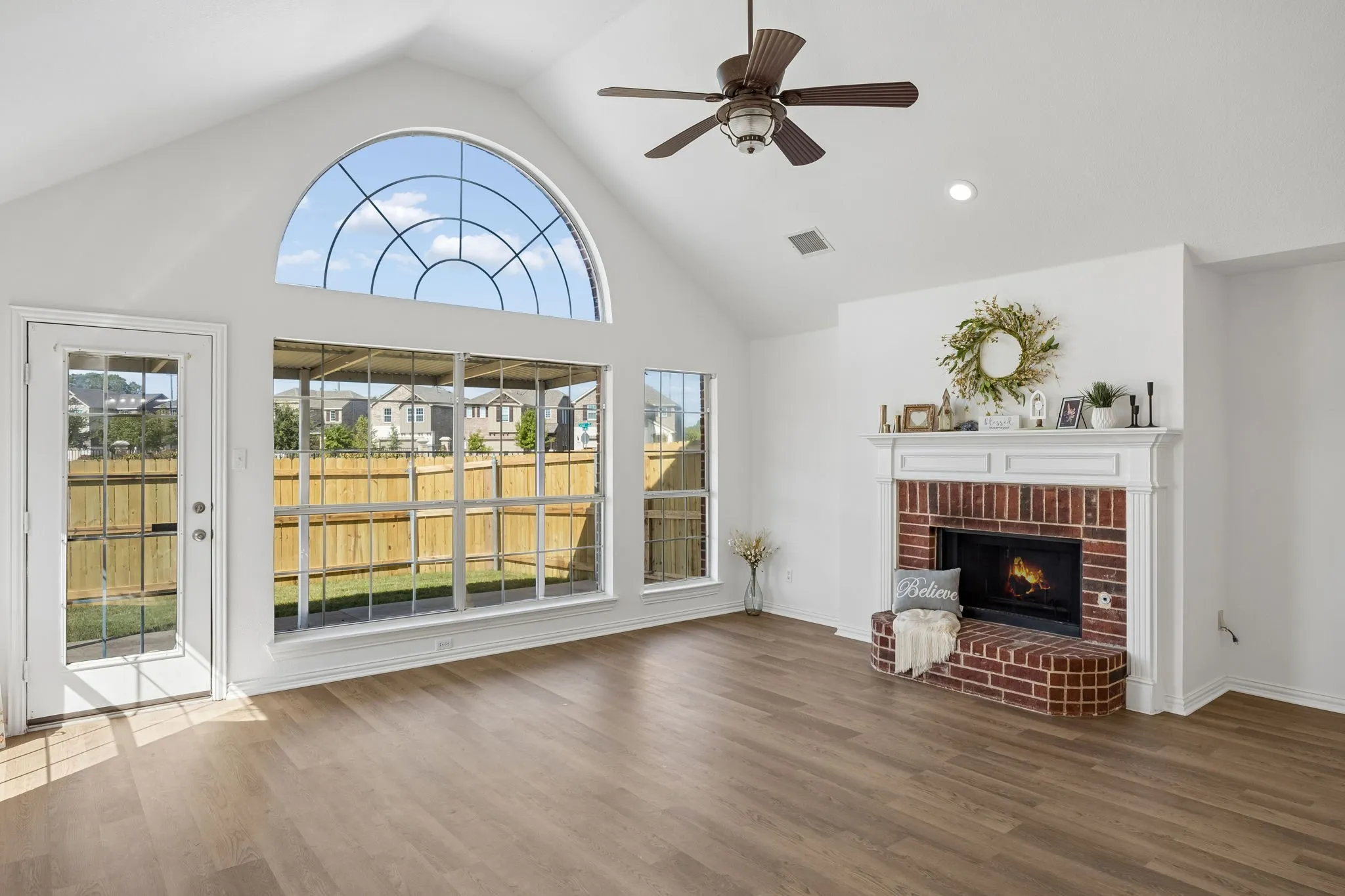 Imagine watching a movie by the warmth of this charming brick fireplace!