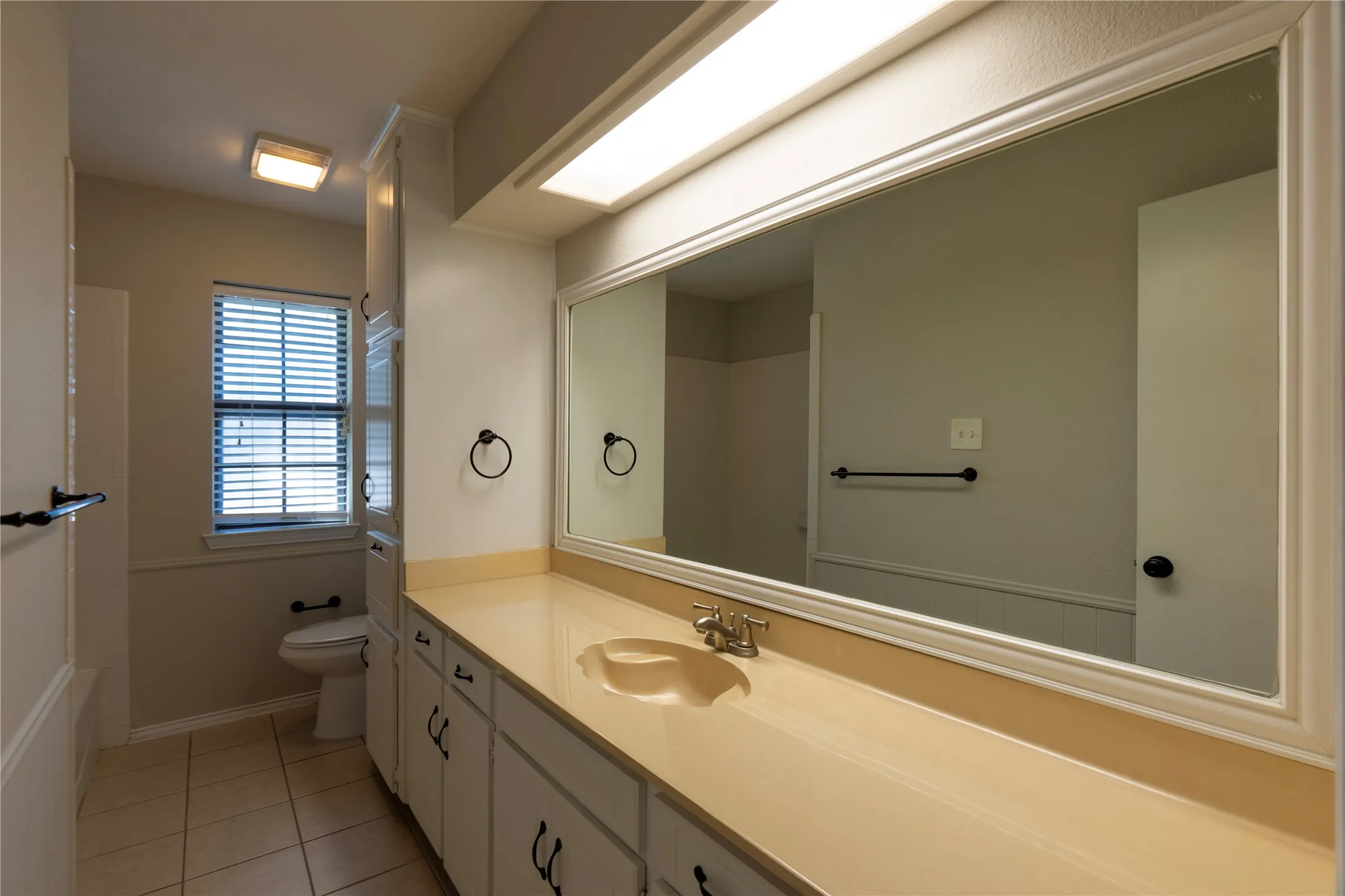 Plenty of counter space in this secondary bathroom