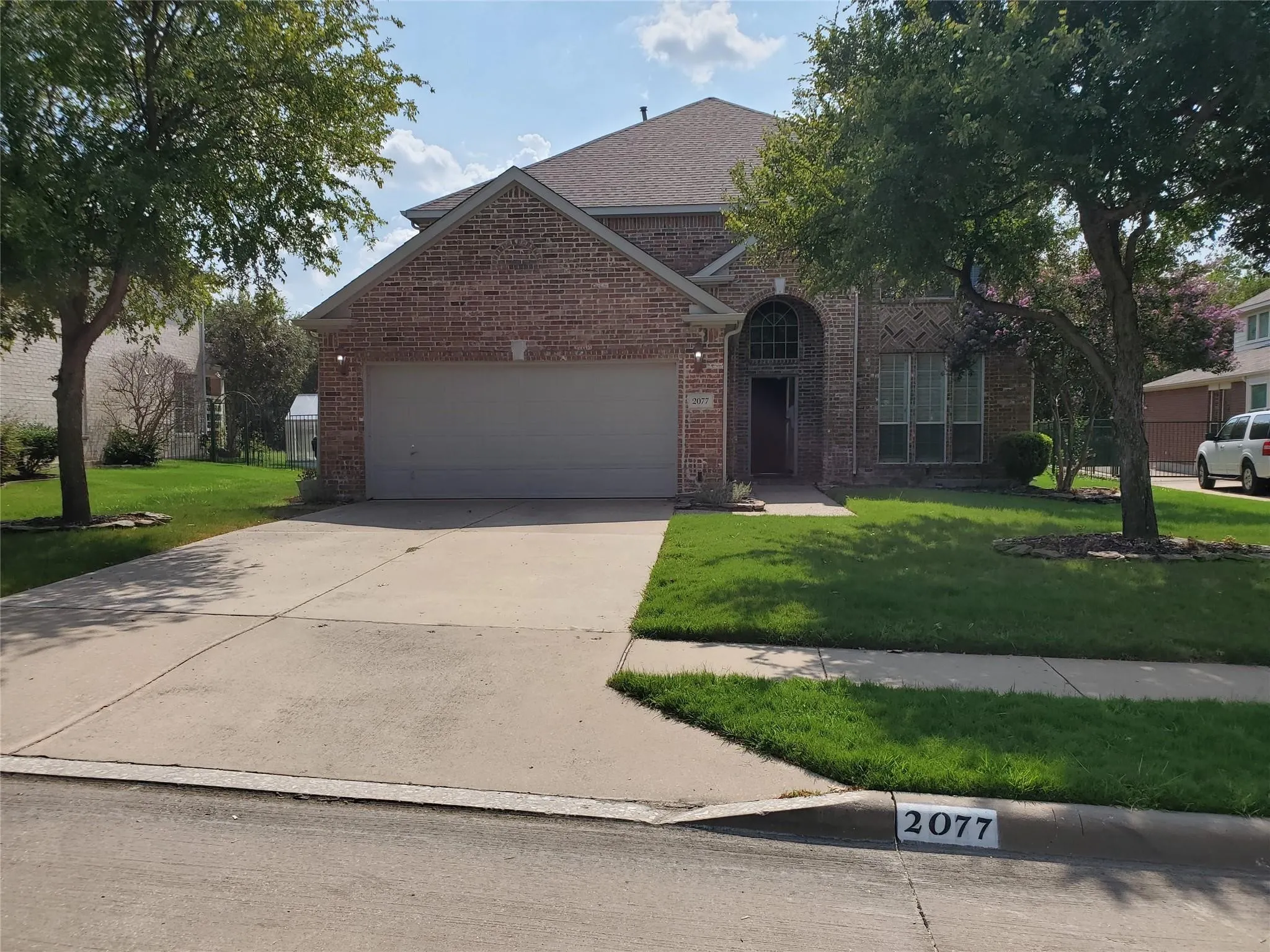 View of front of house with a front yard