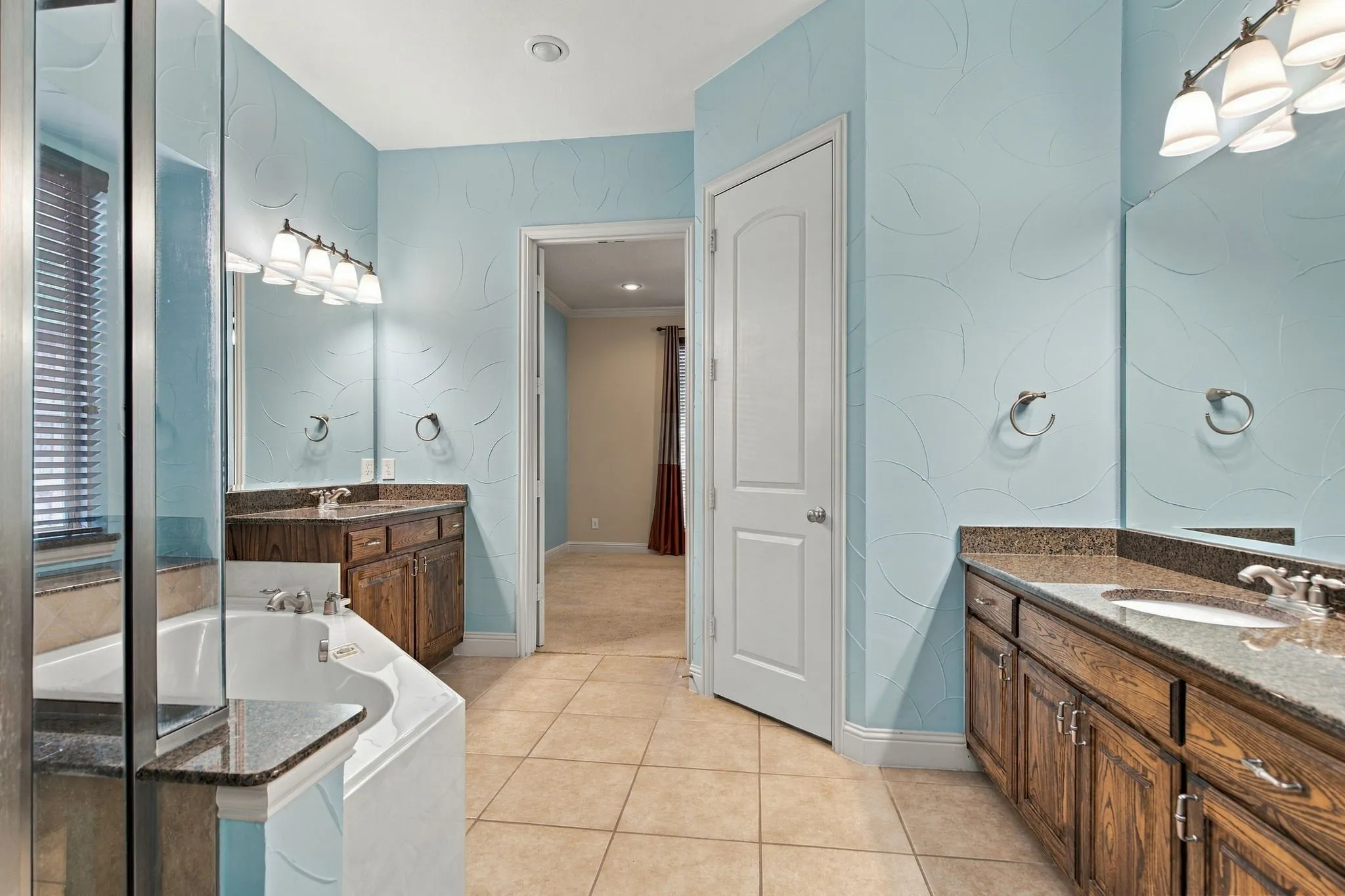 Spacious Primary Bath.  Separate Vanities, tub and shower.
