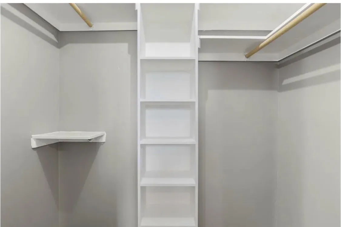 Built-in shelving unit, corner shelf, and two clothing rods