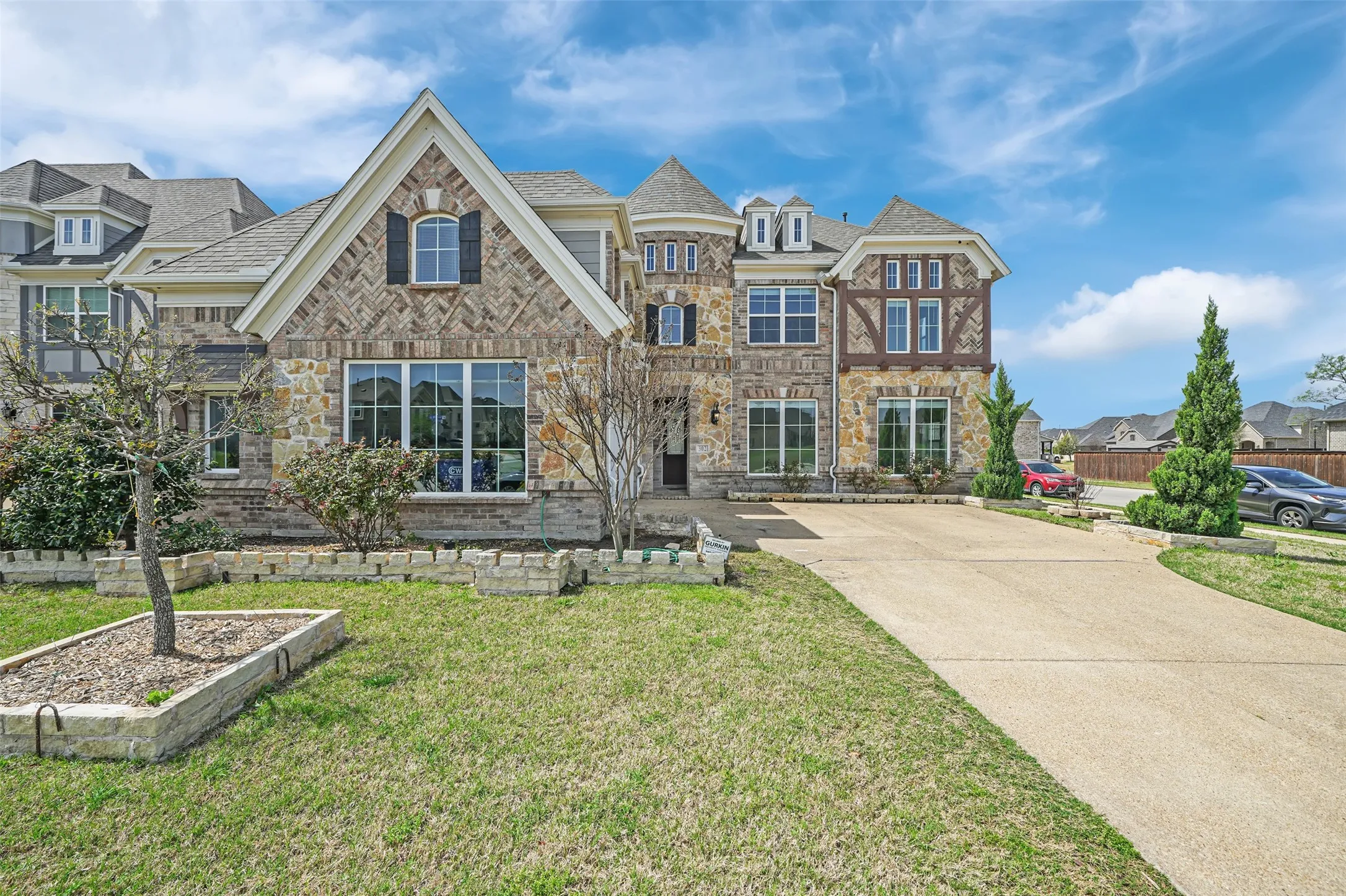 Brick and stone exterior with gabled roof lines