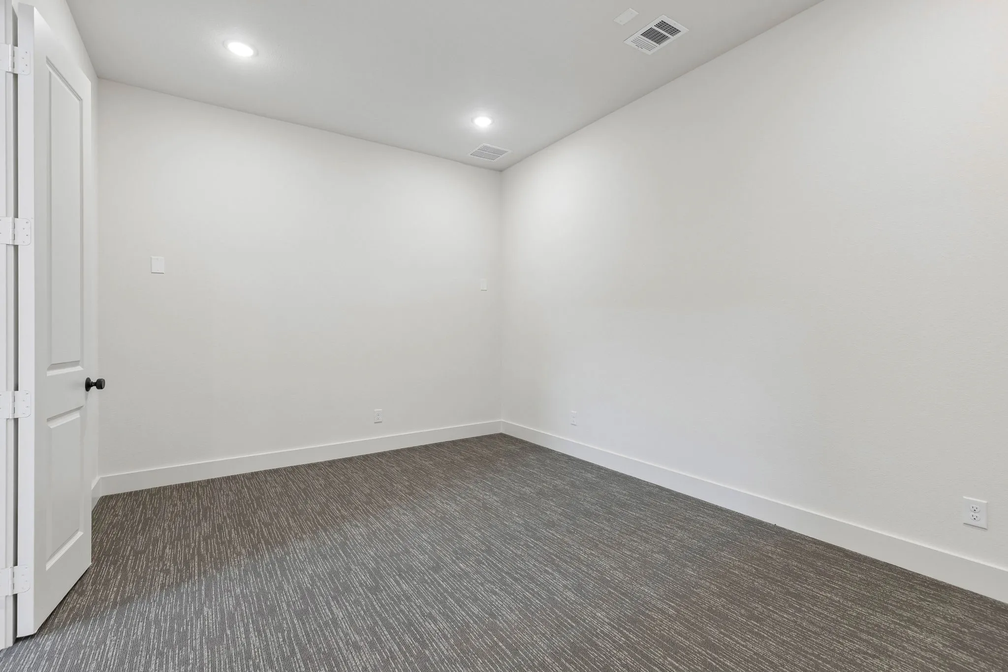 Your new main floor media room with adjacent wet bar is the perfect place to host those big game day parties!