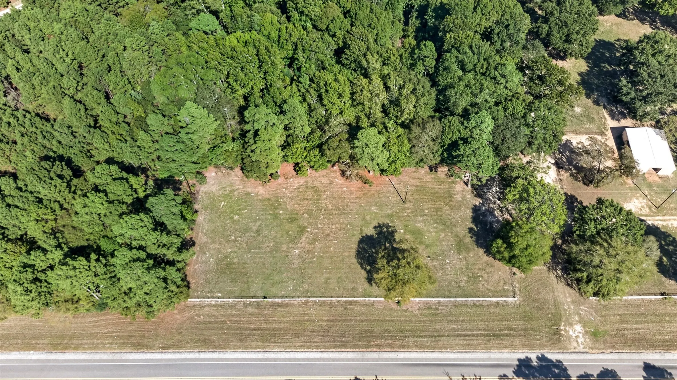 Separately platted one-acre lot with its own water tap and electricity already in place, offering additional flexibility for future expansion.