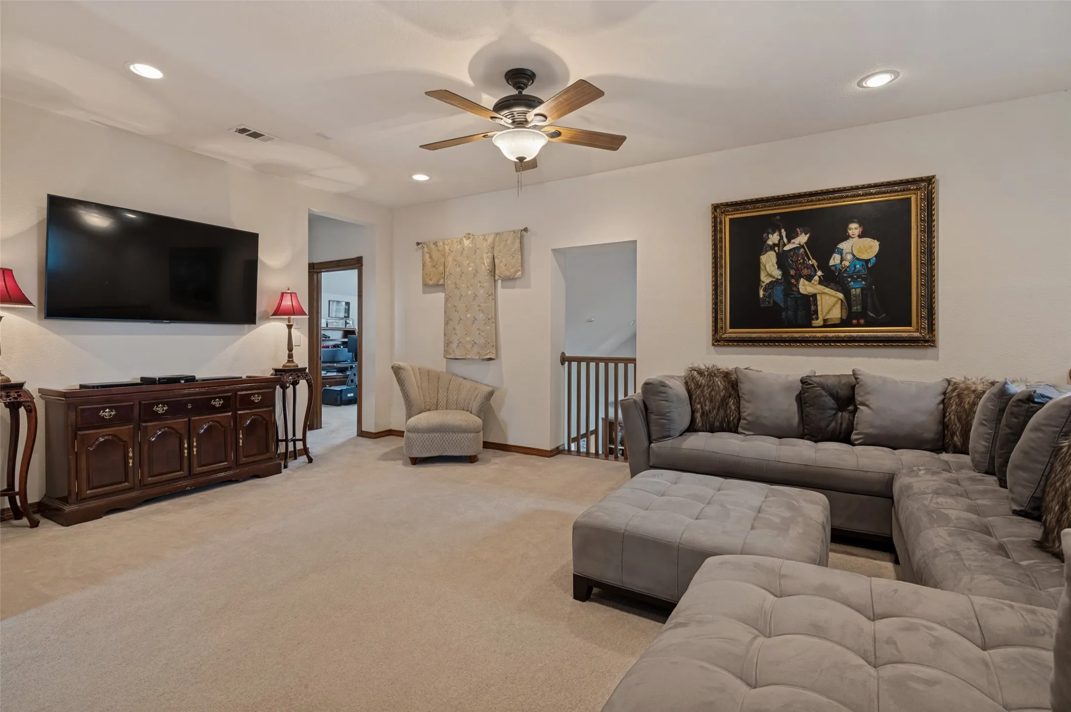 Second living area, sized for a media setup or a playroom