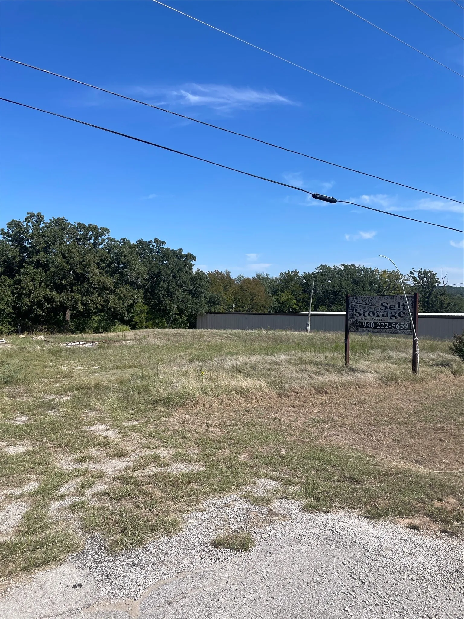 acreage next to storage units. There is a concrete slap. no guarranties as to condition