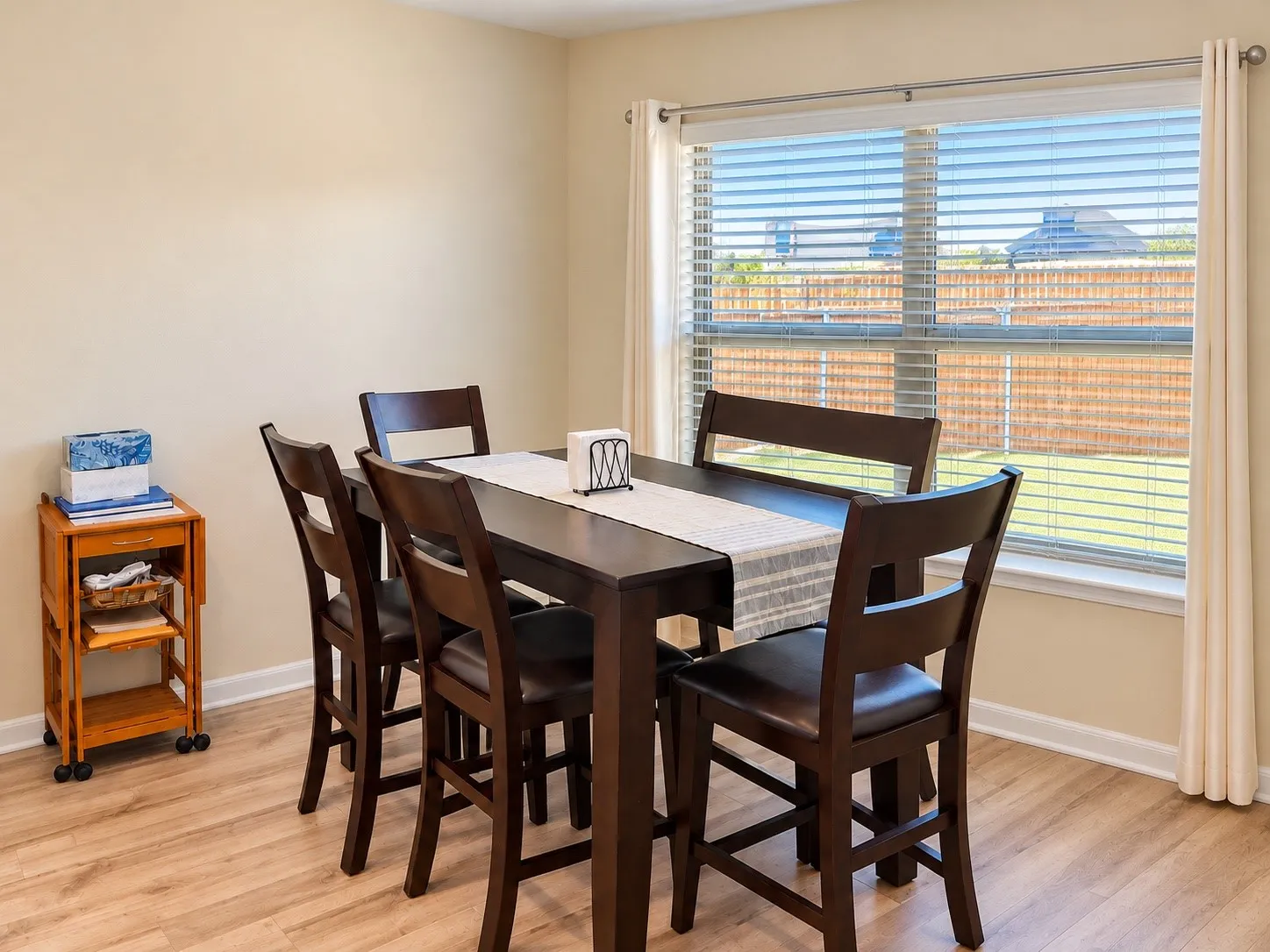 Wood-finish flooring with neutral wall tones