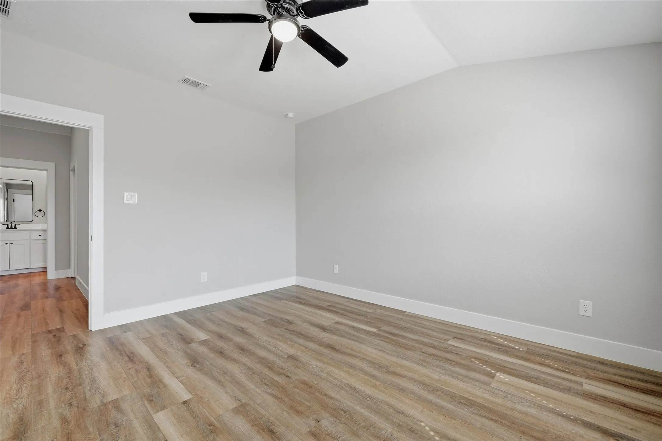 Wood-finish flooring with white trim