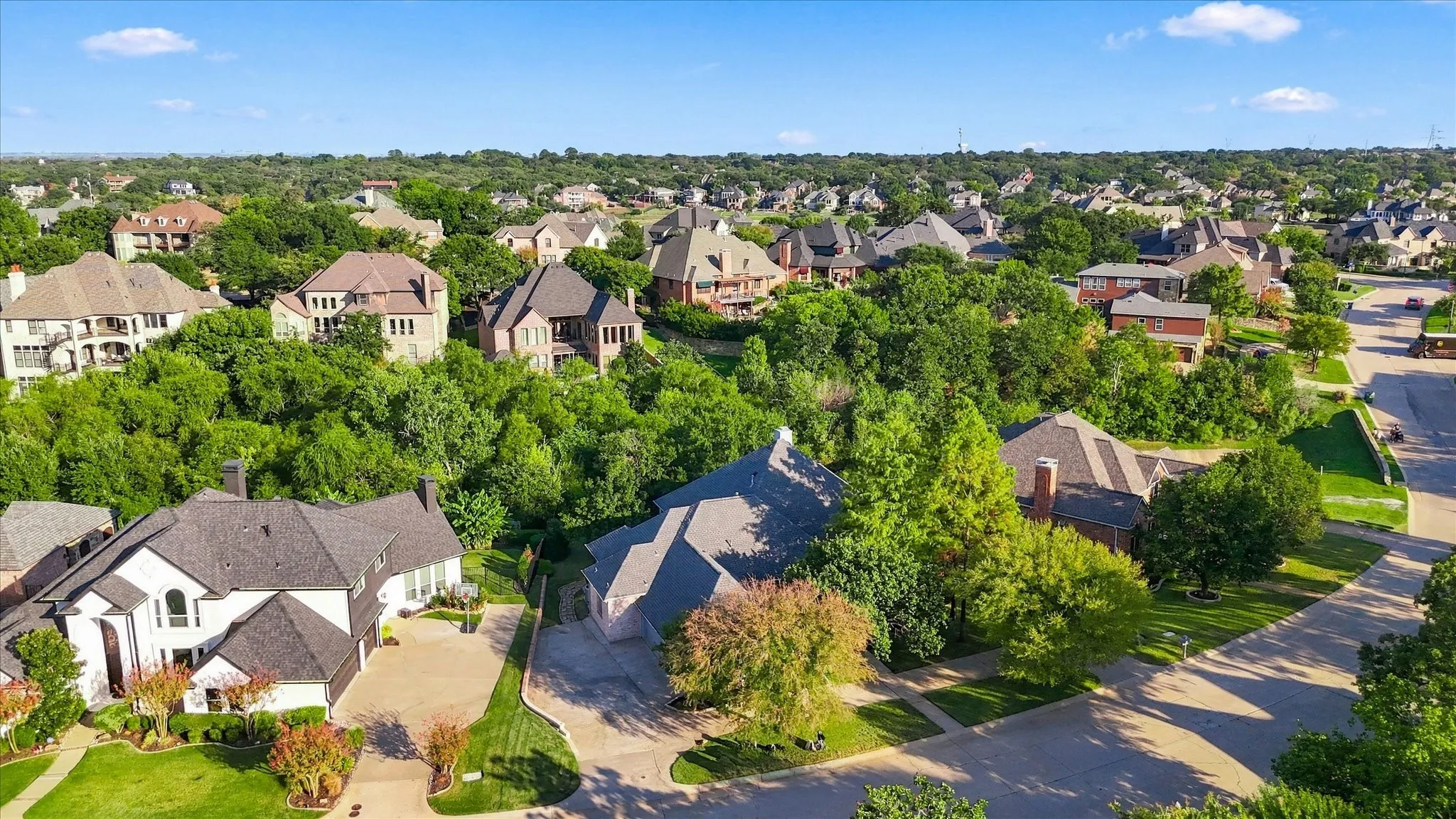 Aerial perspective showcasing multiple properties