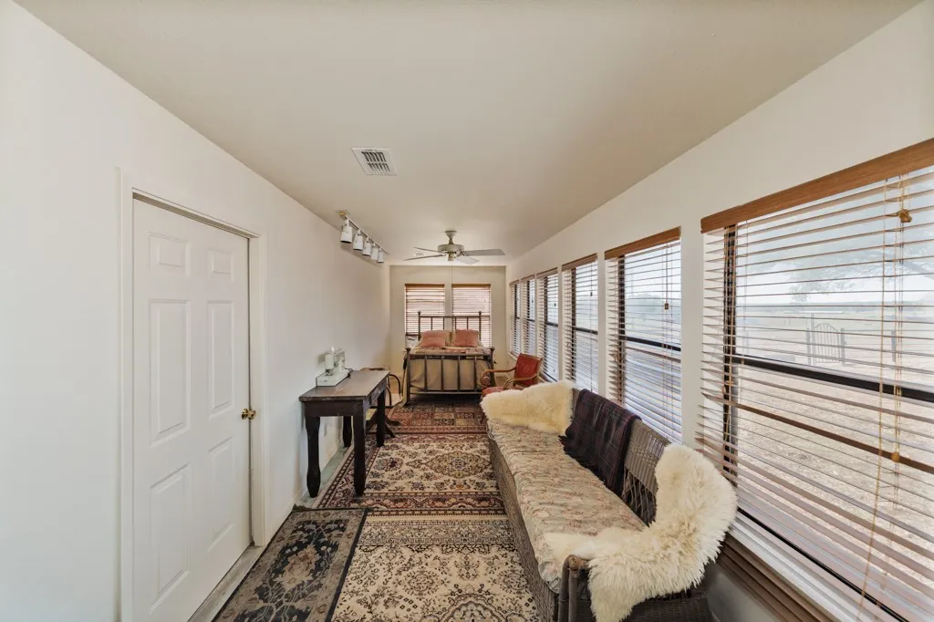 flex space with wall of windows, Access to garage
