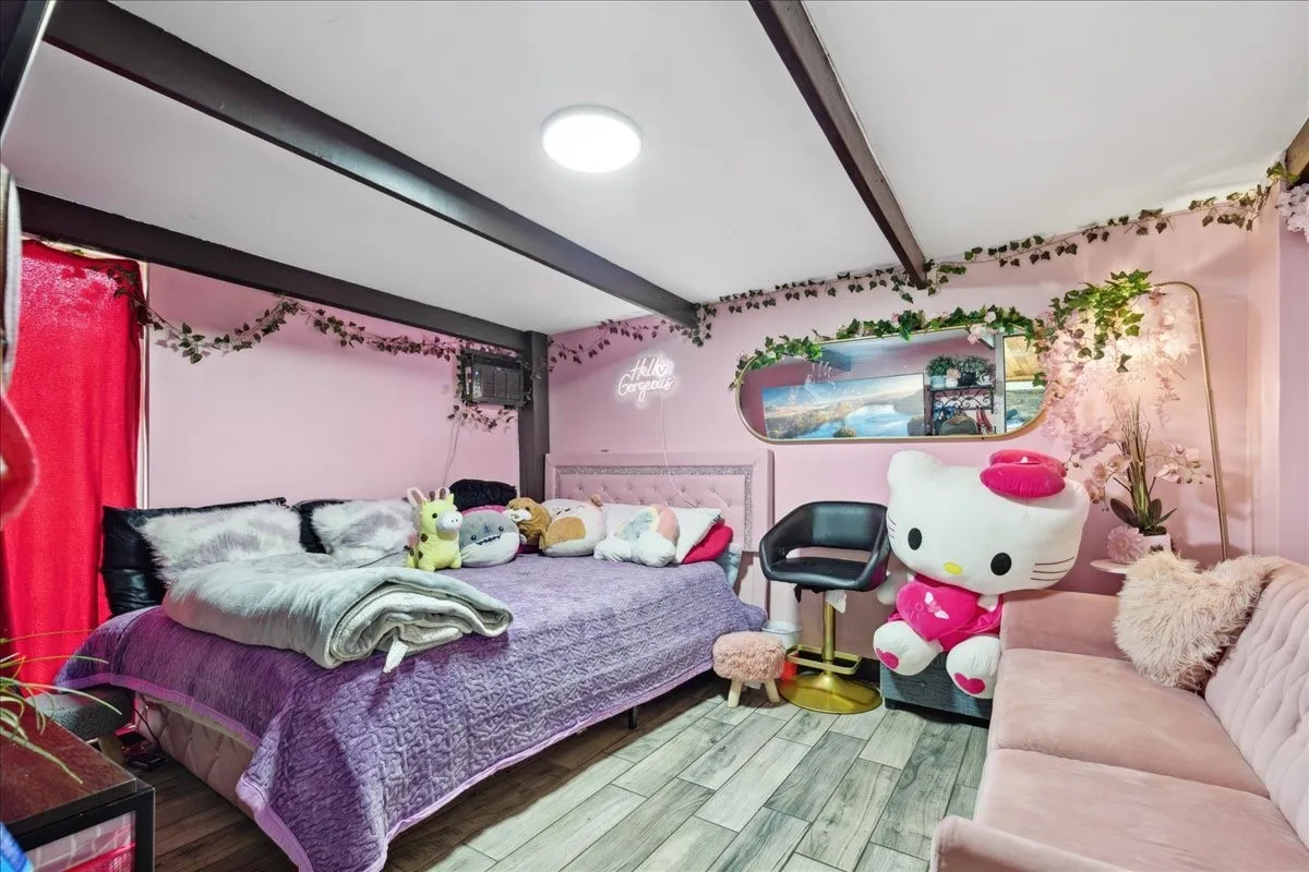 Wood-finish flooring with a flush-mount ceiling light