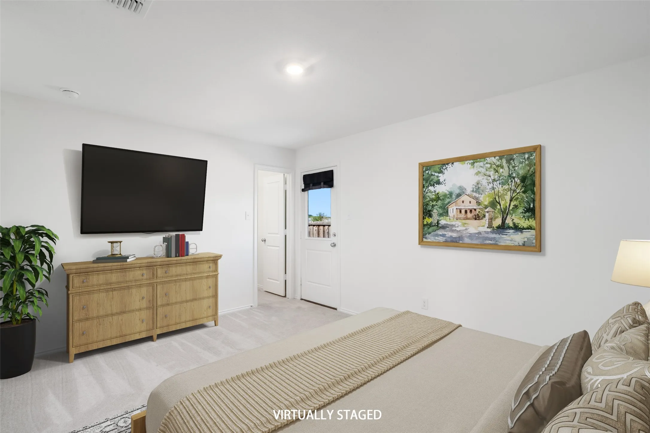 Light-toned carpeted flooring, white walls, recessed ceiling lighting, and a white door with dark hardware