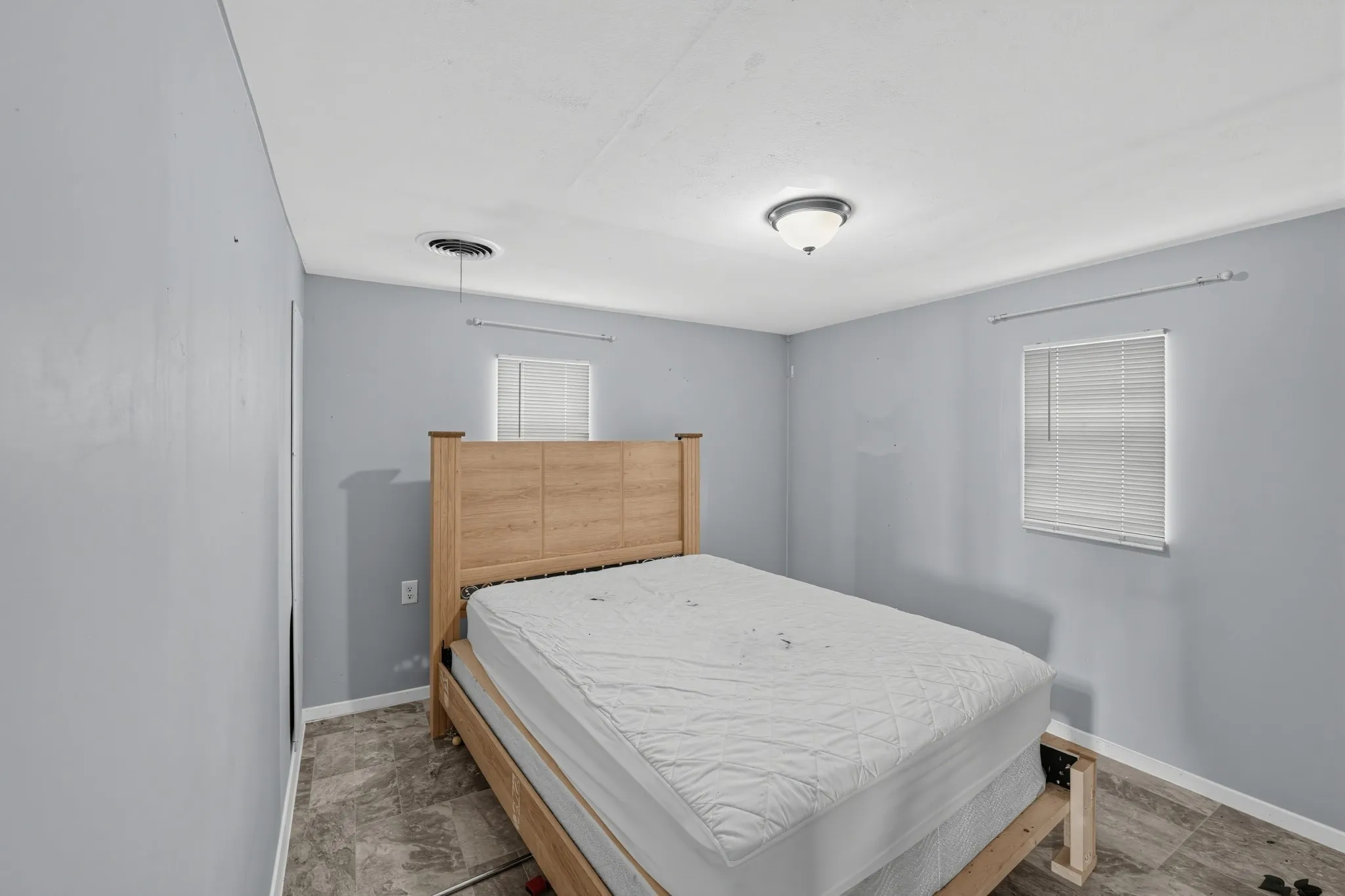 Recessed lighting, flush mount lighting, and wood-finish flooring