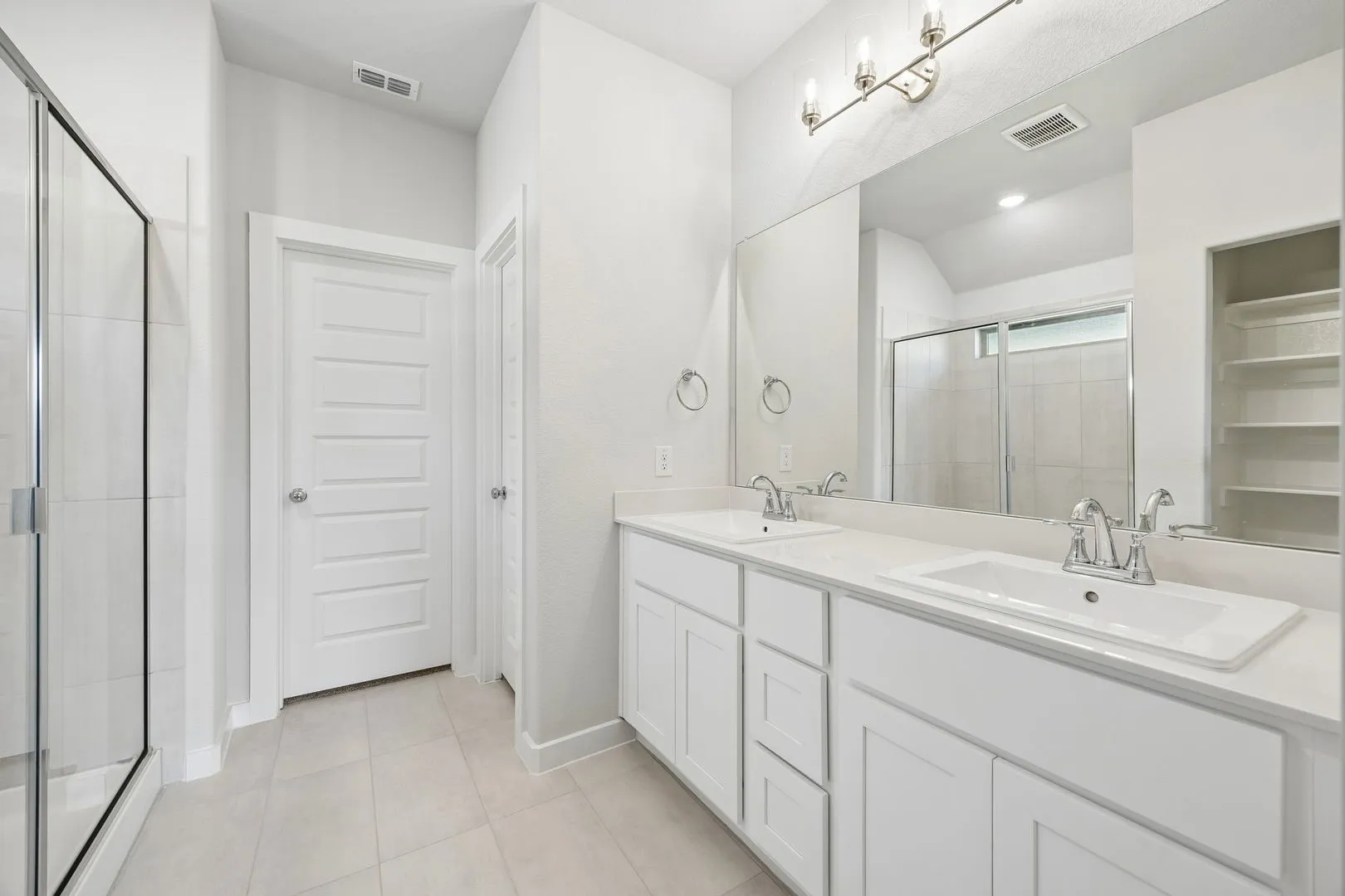Primary Bathroom in the Oscar home plan – REPRESENTATIVE PHOTO