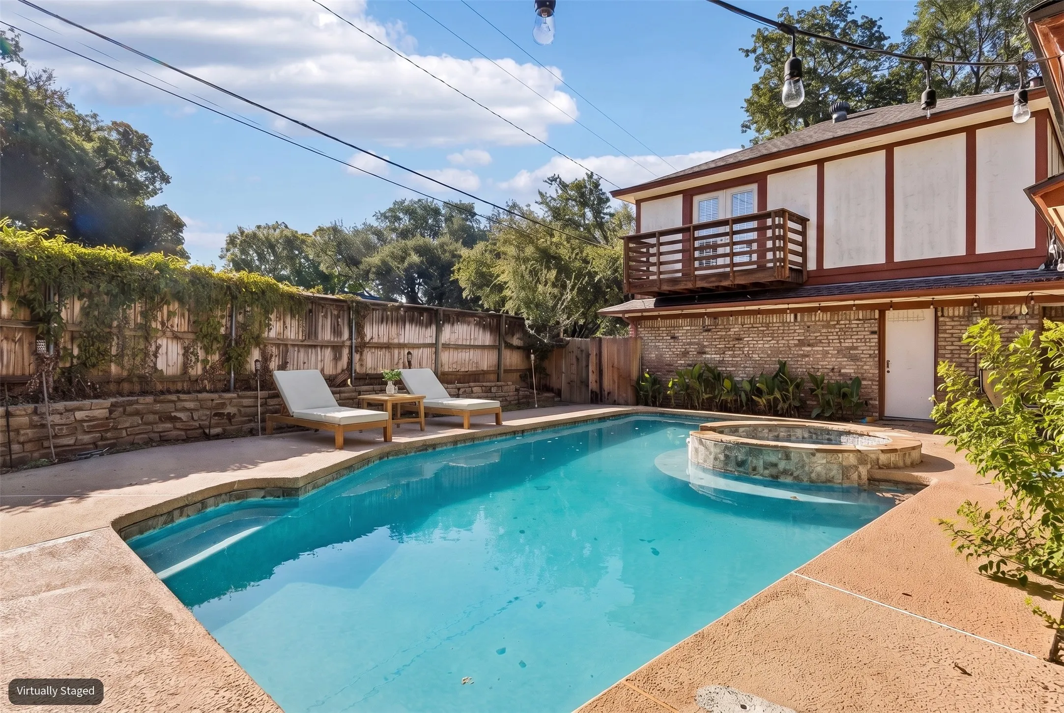 Sparkling backyard pool offering a relaxing outdoor retreat.