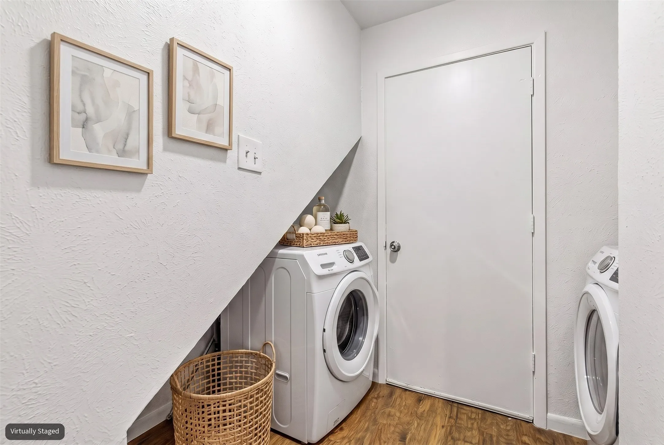 Convenient laundry are with space for full-size washer and dryer.