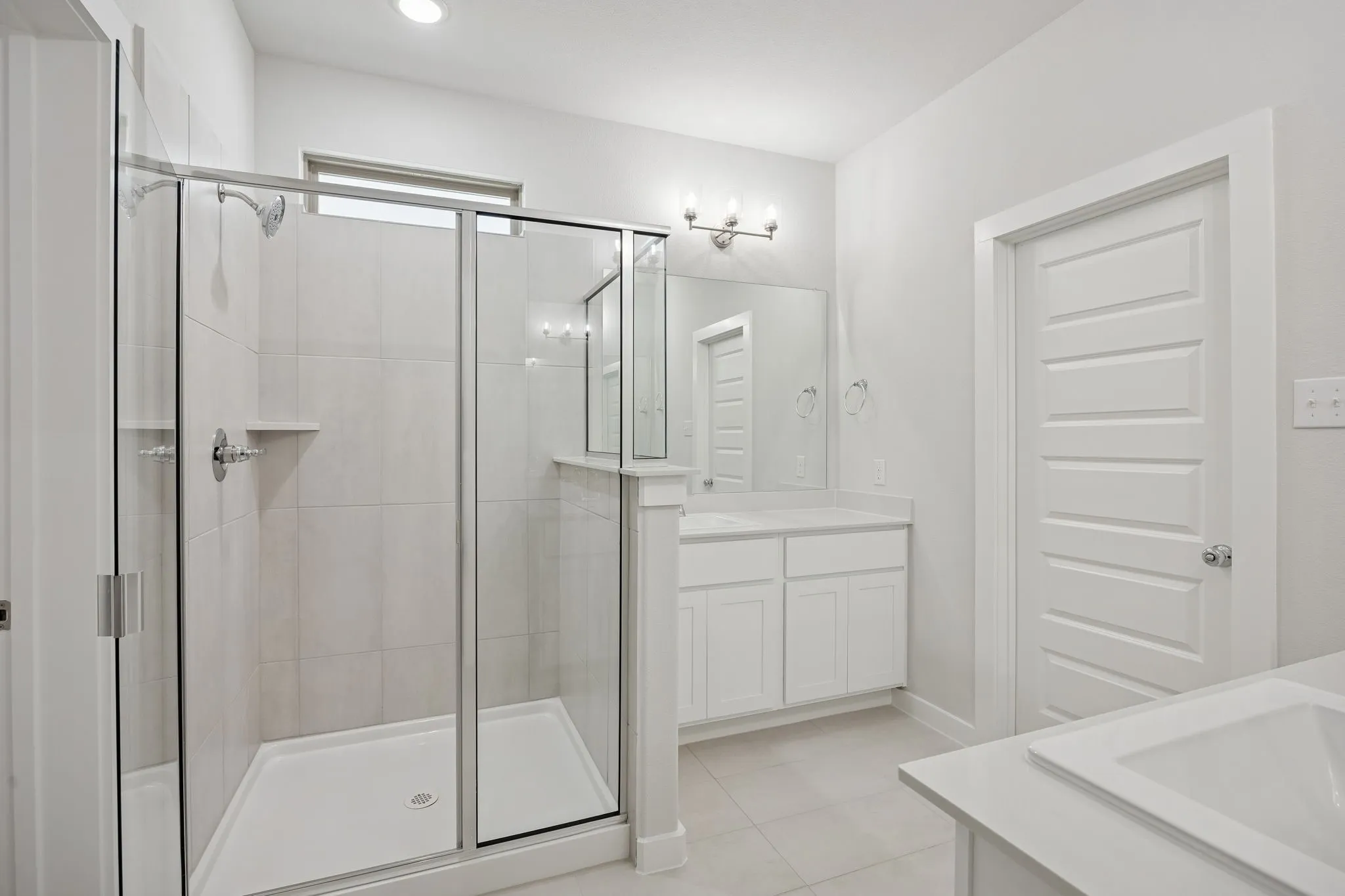 Primary Bathroom in the Masters home plan – REPRESENTATIVE PHOTO
