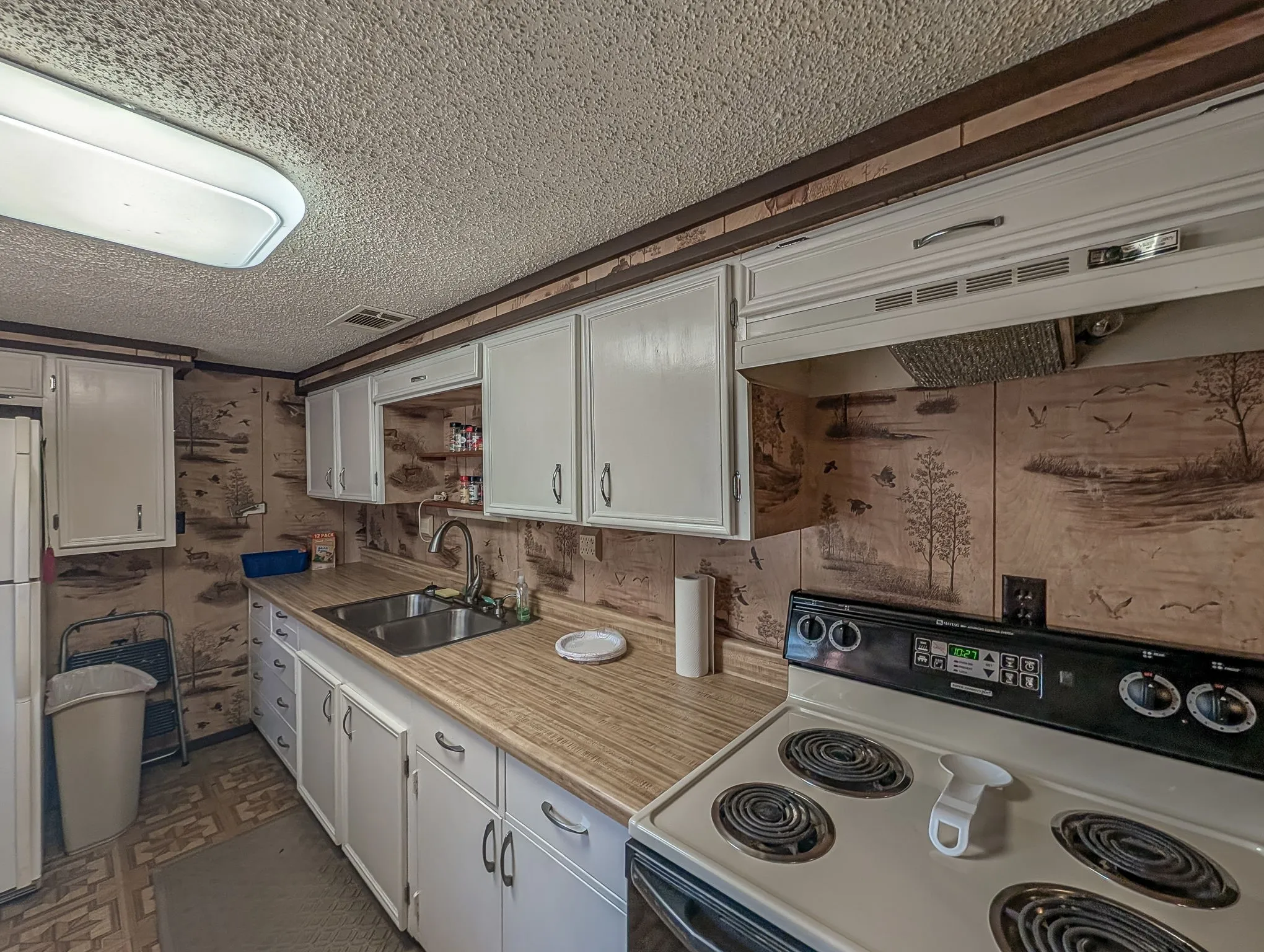 Kitchen with electric range