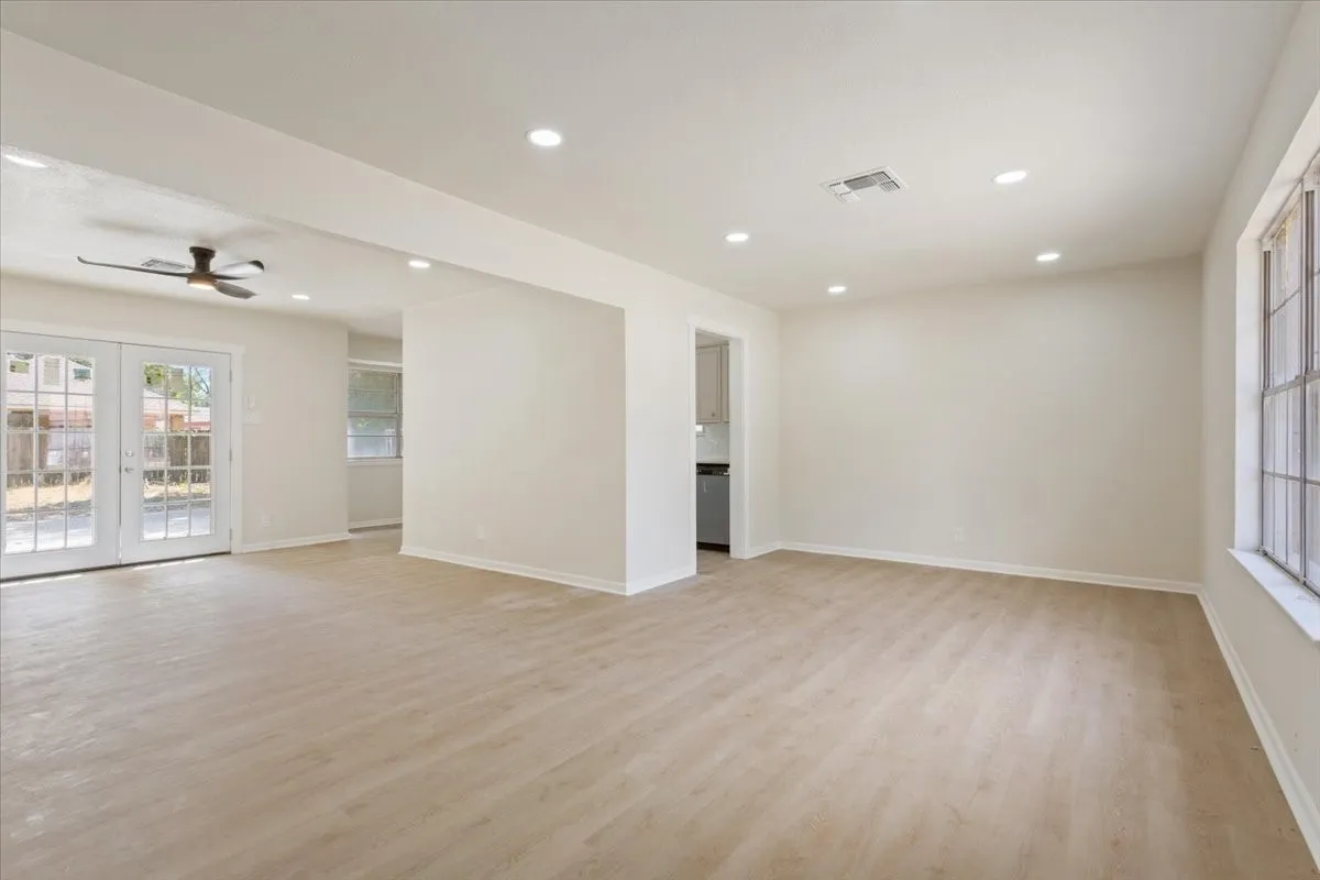 Light, bright and neutral was the theme for the complete interior paint choices and new vinyl plank flooring thru out.