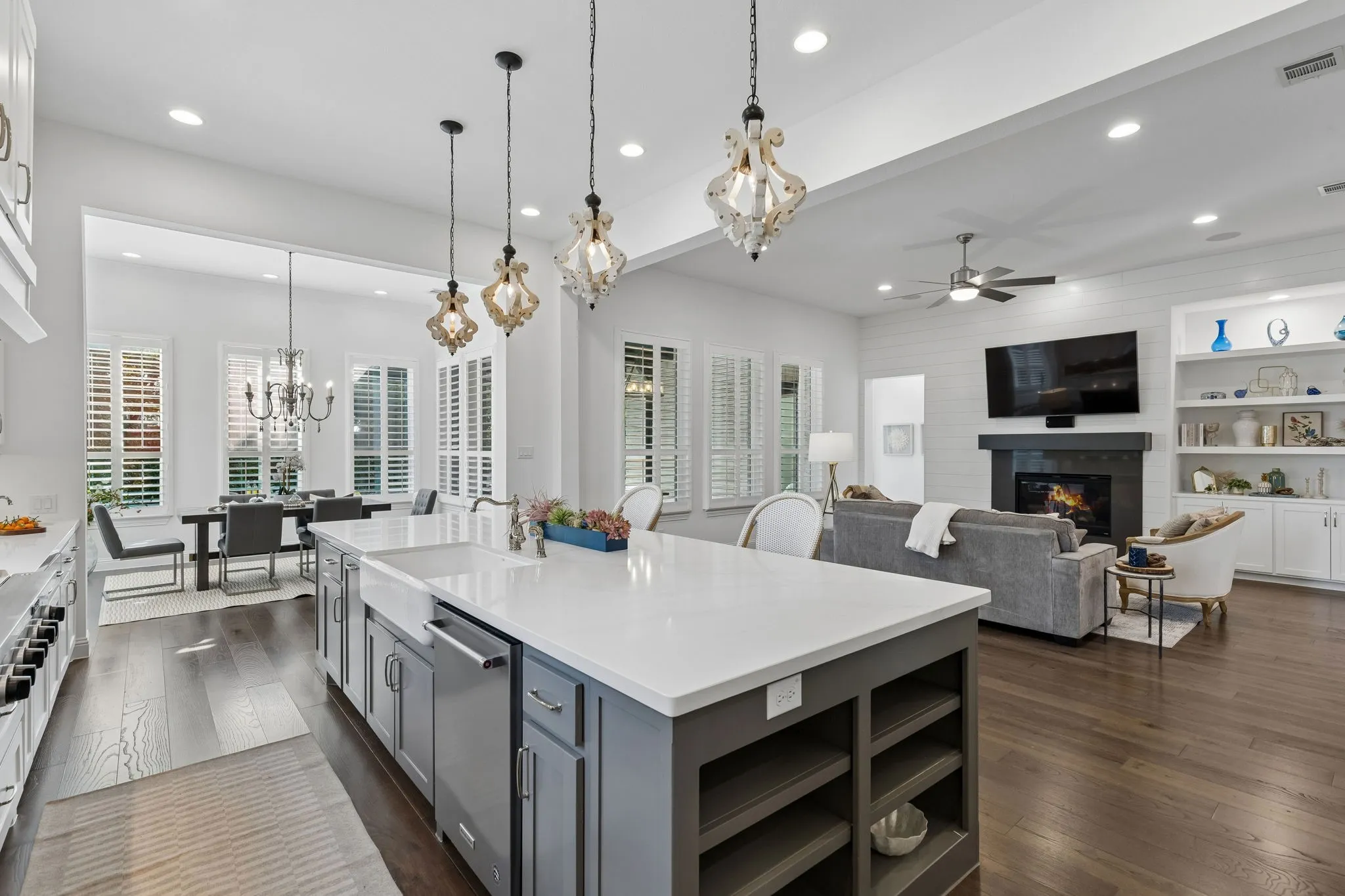 Kitchen open to Family Room, plantation shutters throughout