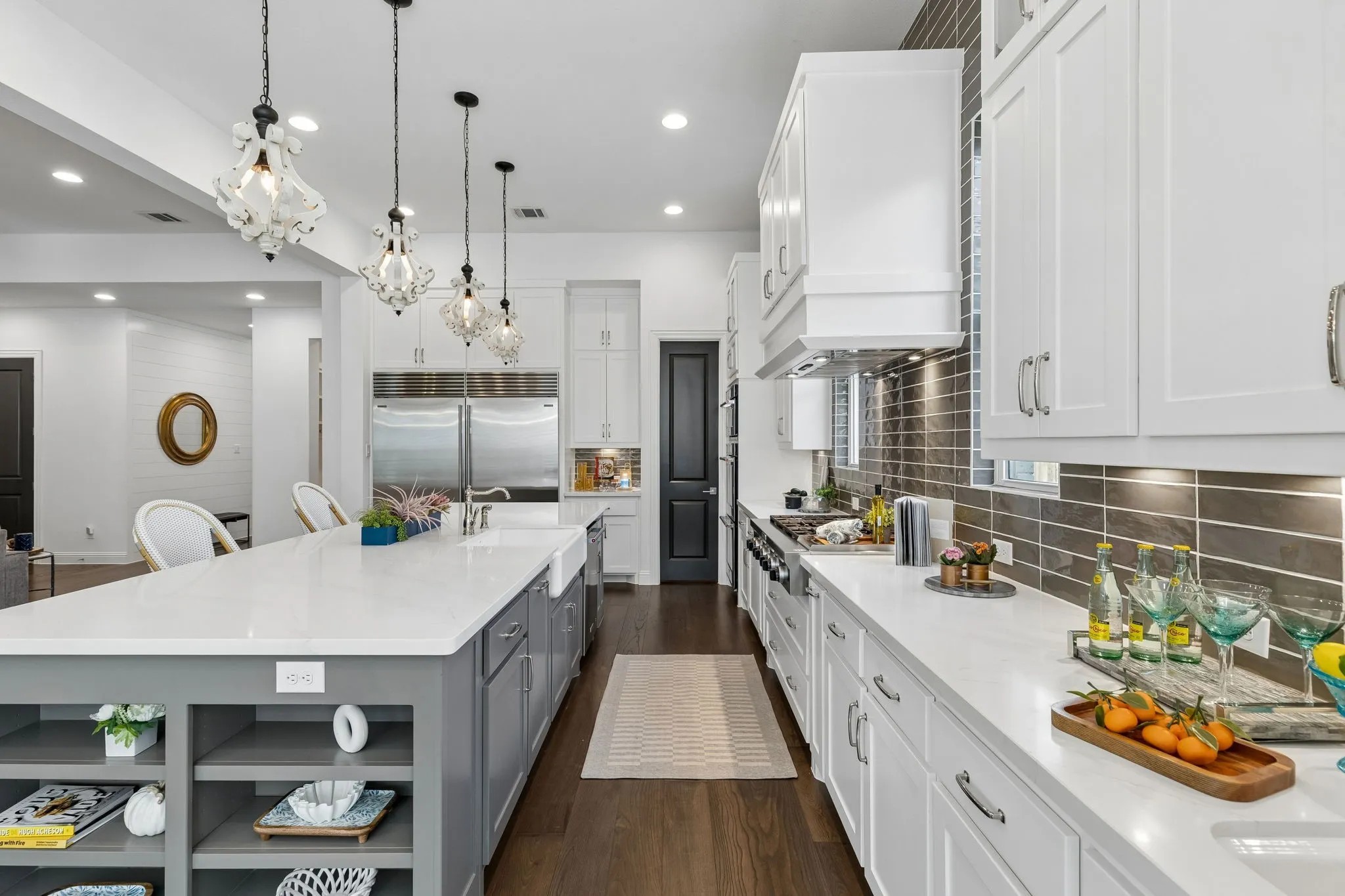 Expansive kitchen island and workspace, wet bar area, coffee nook,