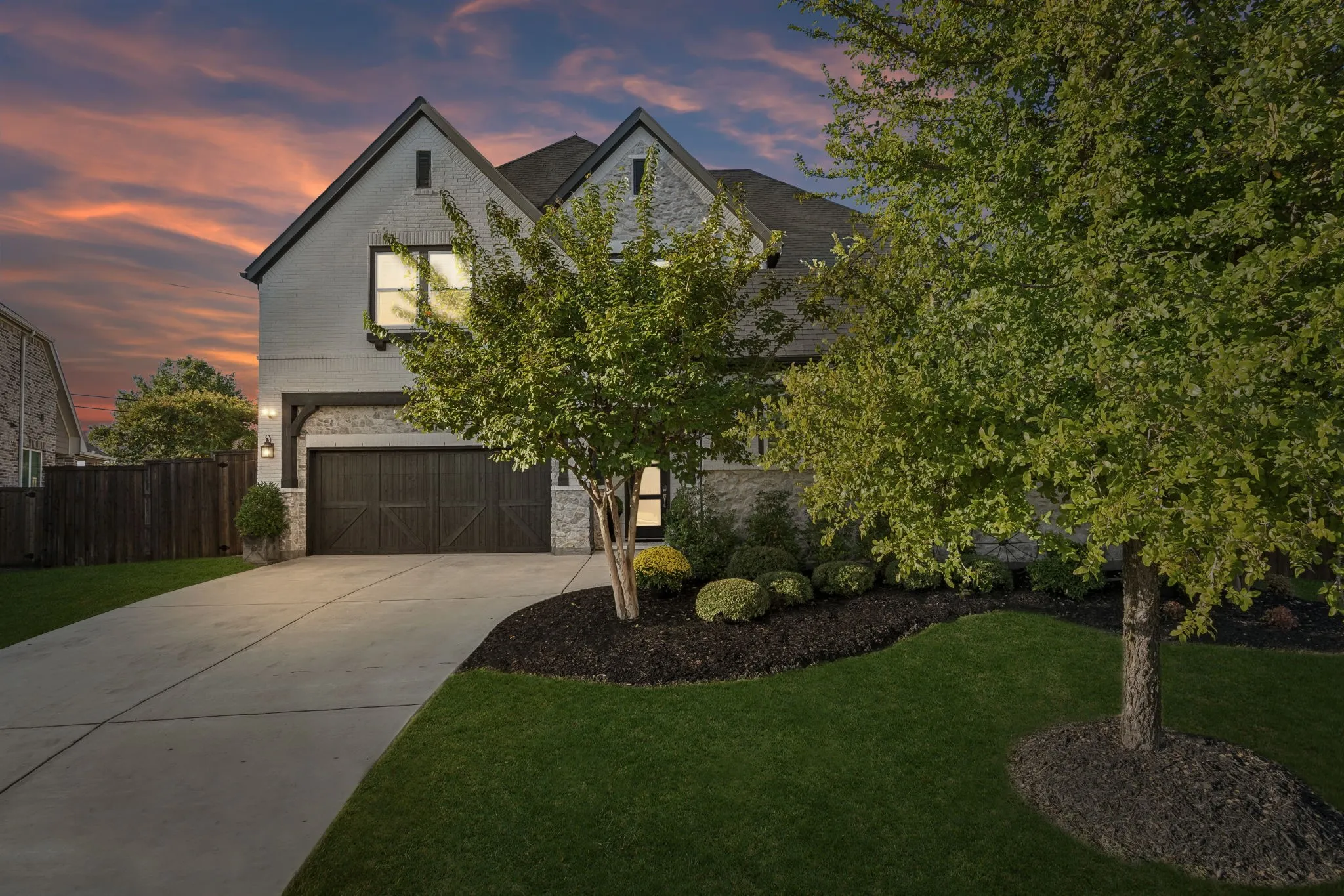 Desirable University Hills home with beautiful landscaping, 3 car garage.