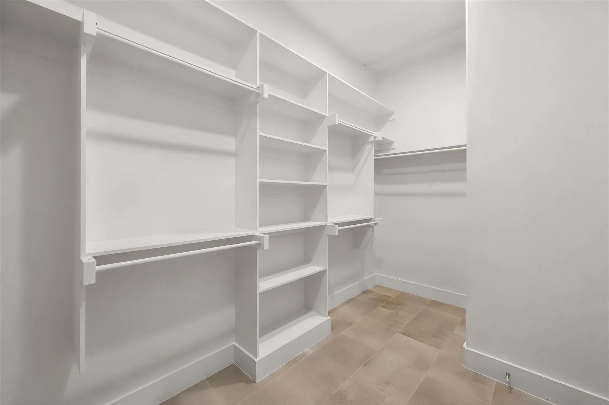 Primary bedroom custom walk-in closet