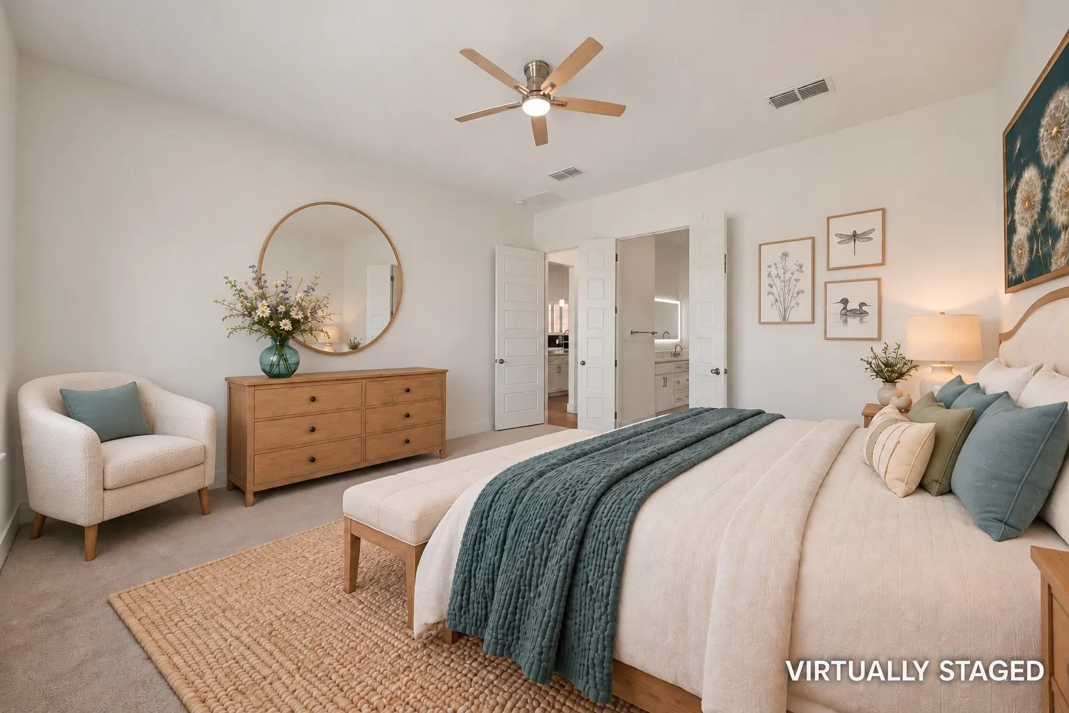 Virtually staged primary bedroom showing proximity to kitchen and entrance to primary bathroom.