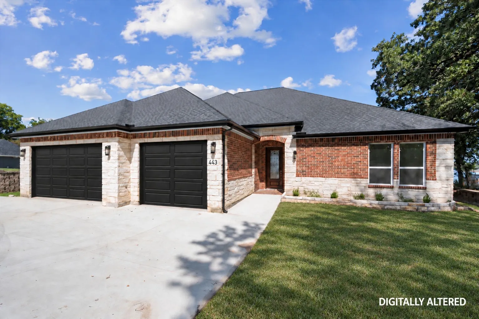 Digitally Altered view of front of house to demonstrate builder's intended garage door install and seeded grass grown-in.