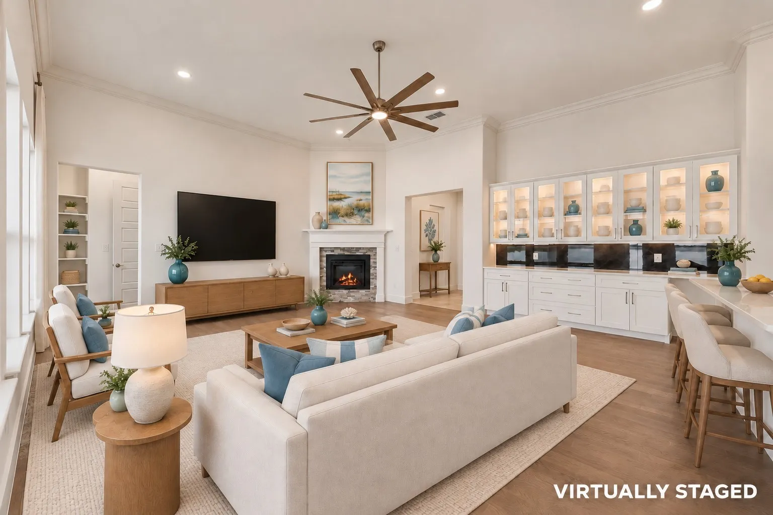 Virtually staged open concept living room with custom built-in buffet.