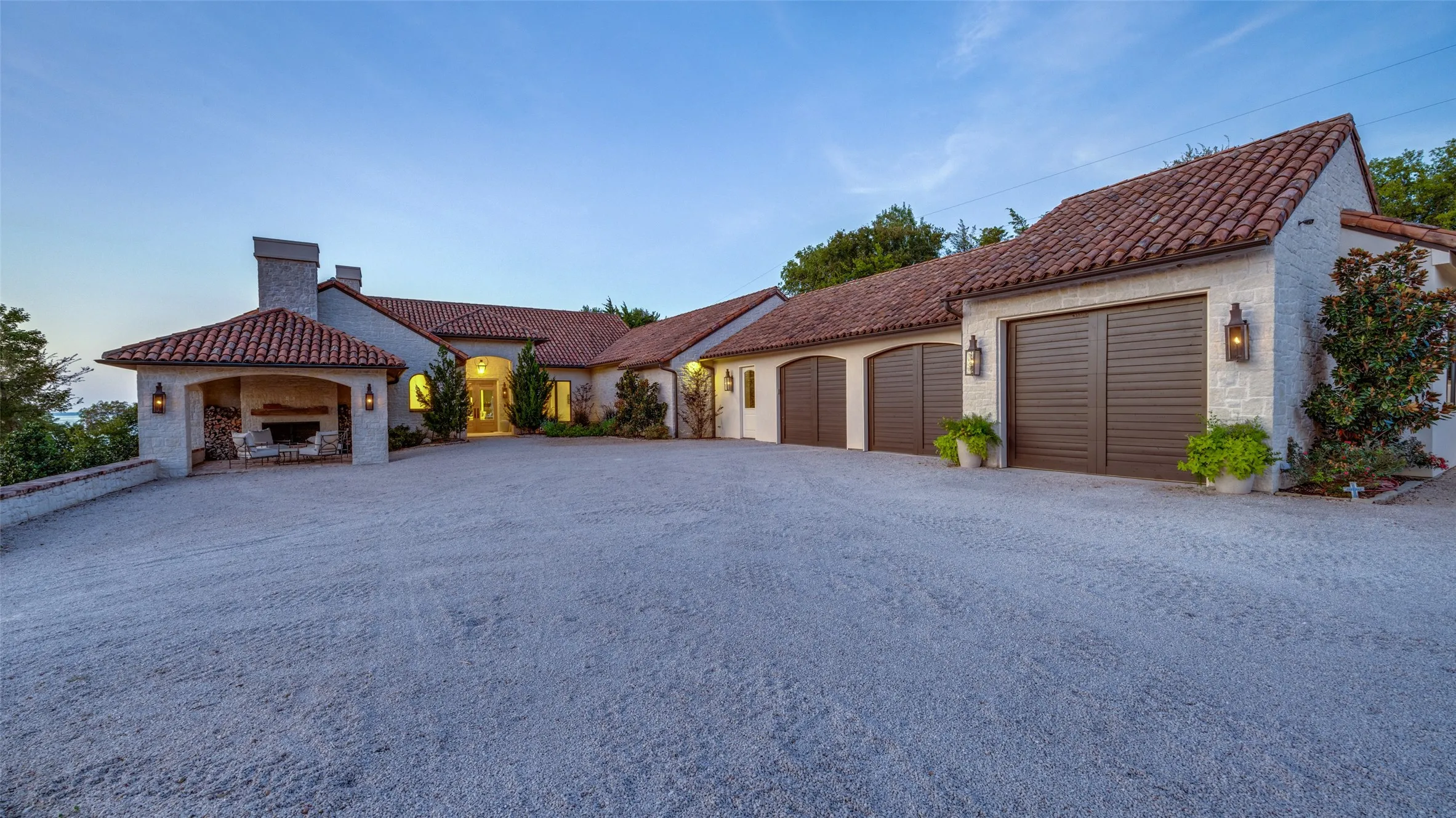 Spanish Colonial-inspired exterior with a terracotta tile roof