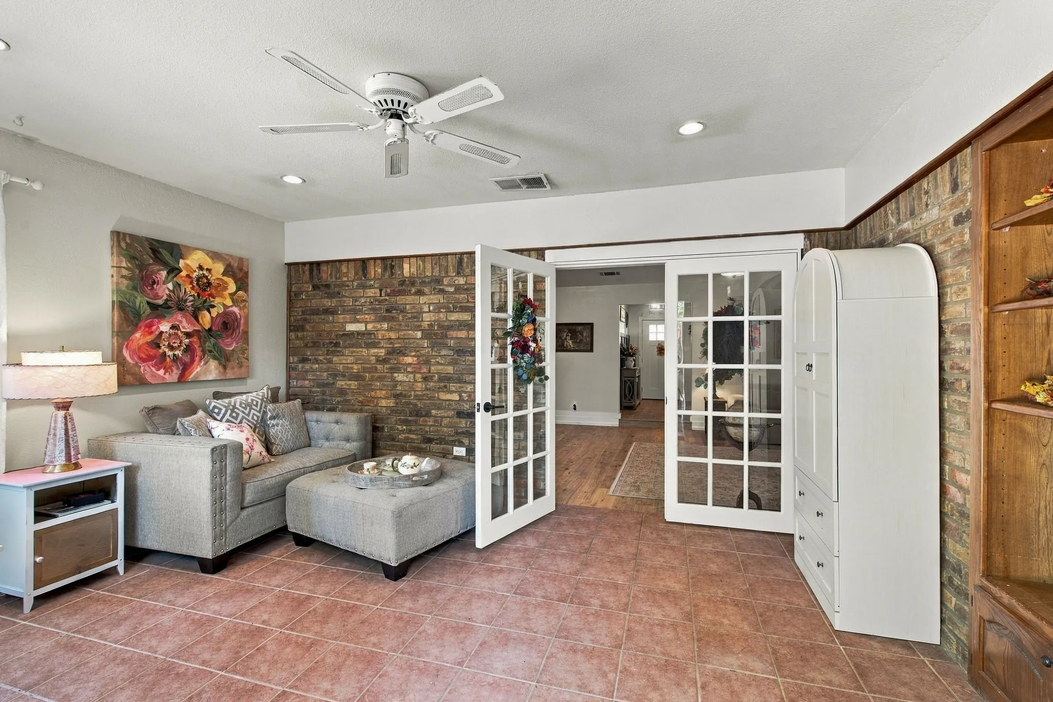Sunroom leading to the pool.
