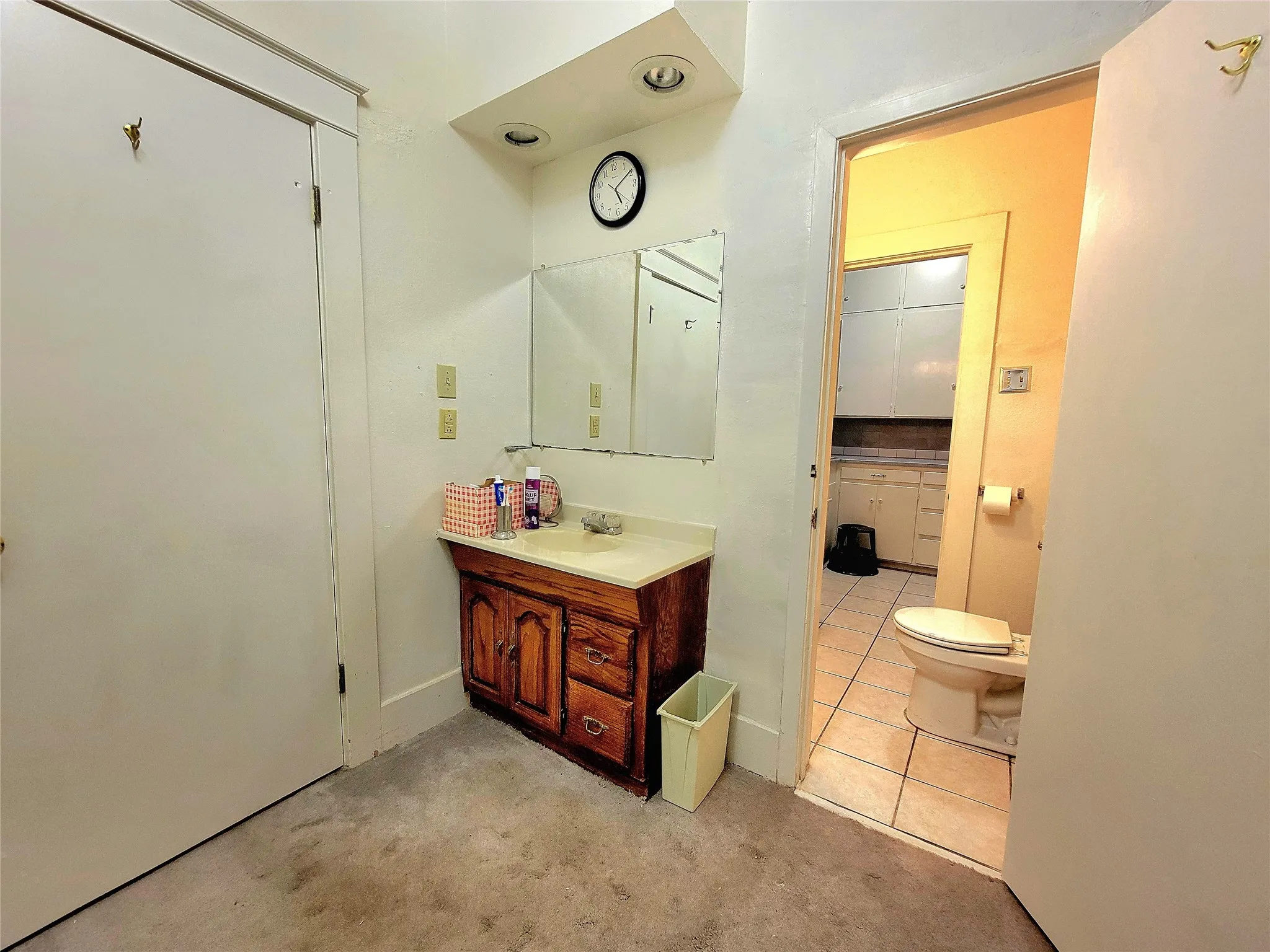 1st floor - Primary bathroom with entry from dressing area and from laundry room
