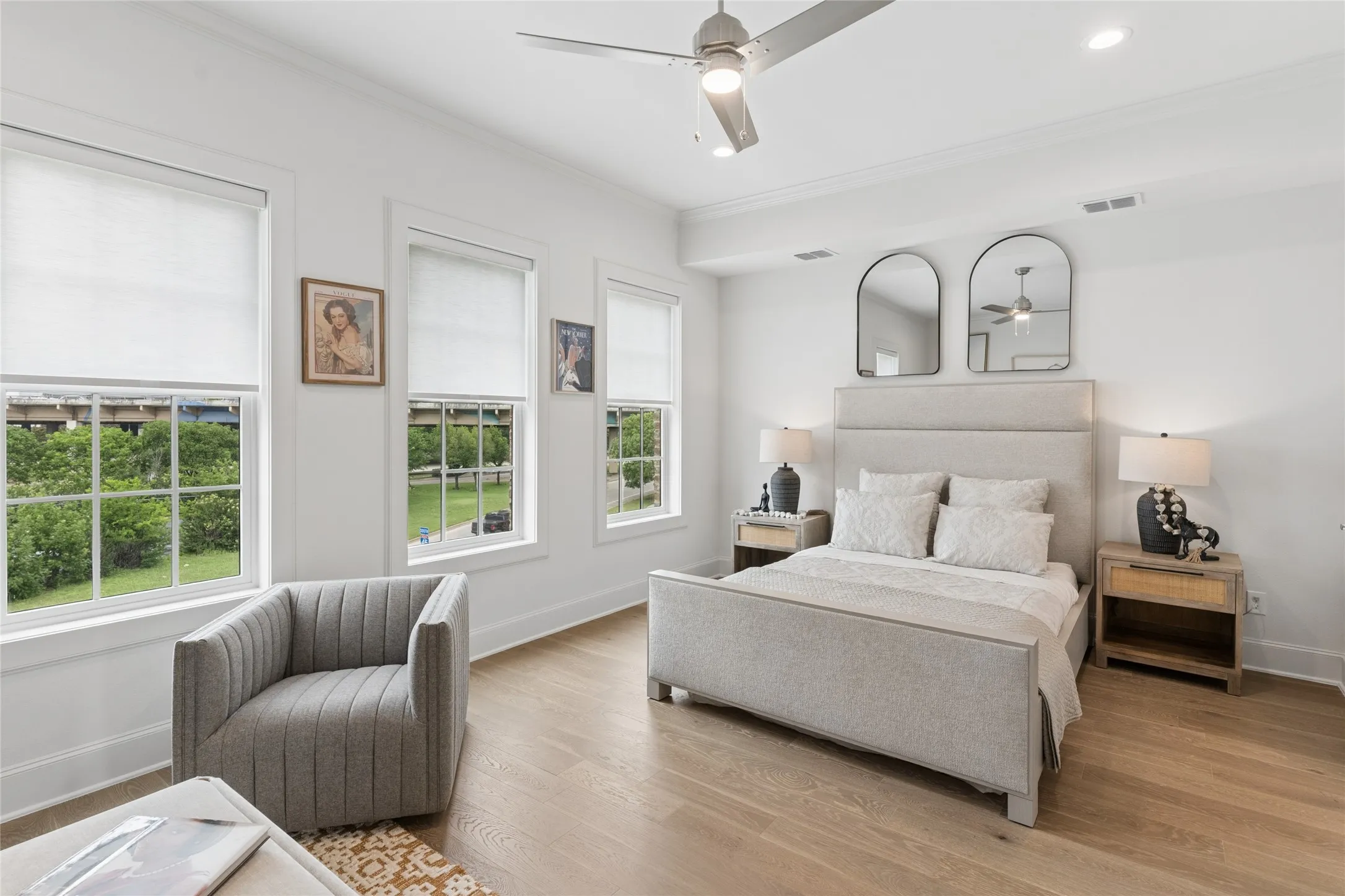 The spacious primary suite offers a private retreat, complete with a spa-inspired en suite bathroom and an expansive walk-in closet. Image of model home with similar layout.