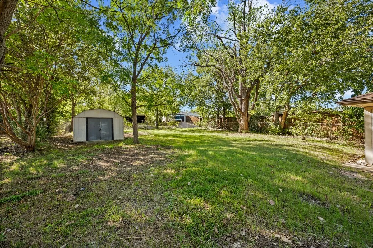 This yard is big enough to host all yourn friends and family for a Fall BBQ!