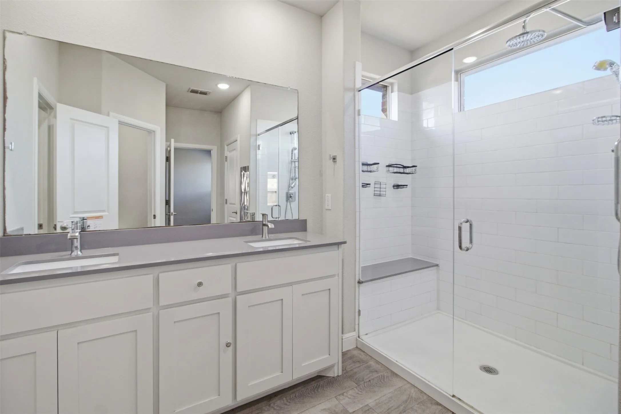 Dual vanity with undermount sinks and chrome fixtures