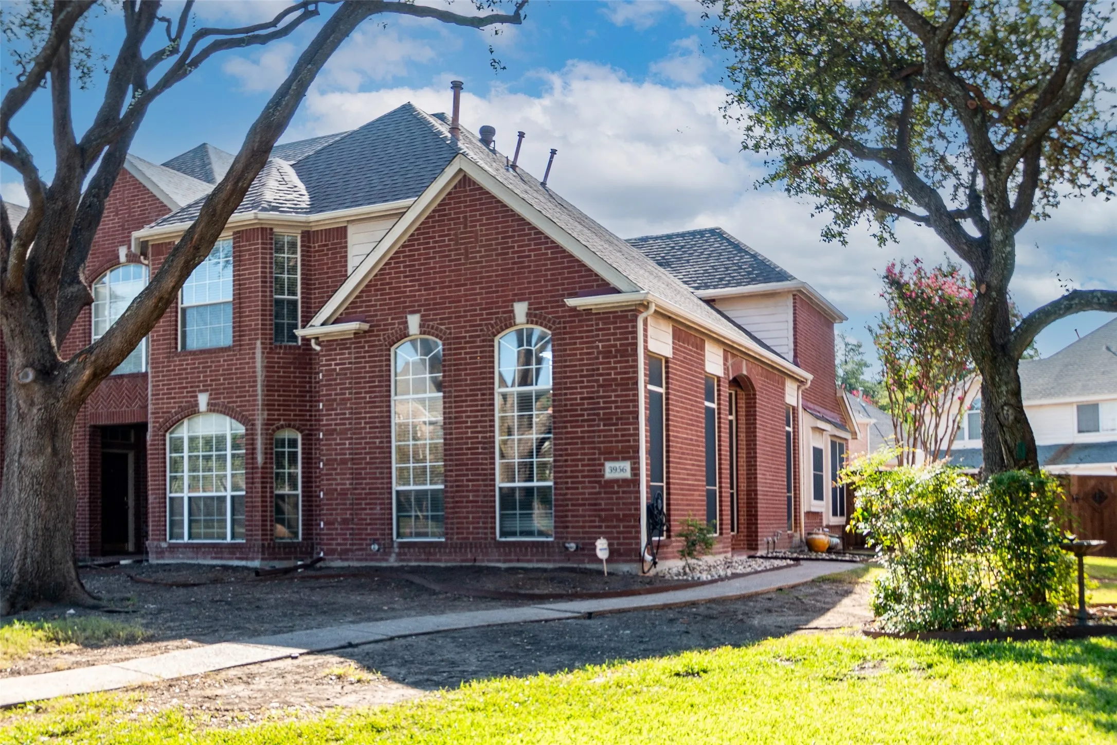 Brick exterior with gabled roof lines