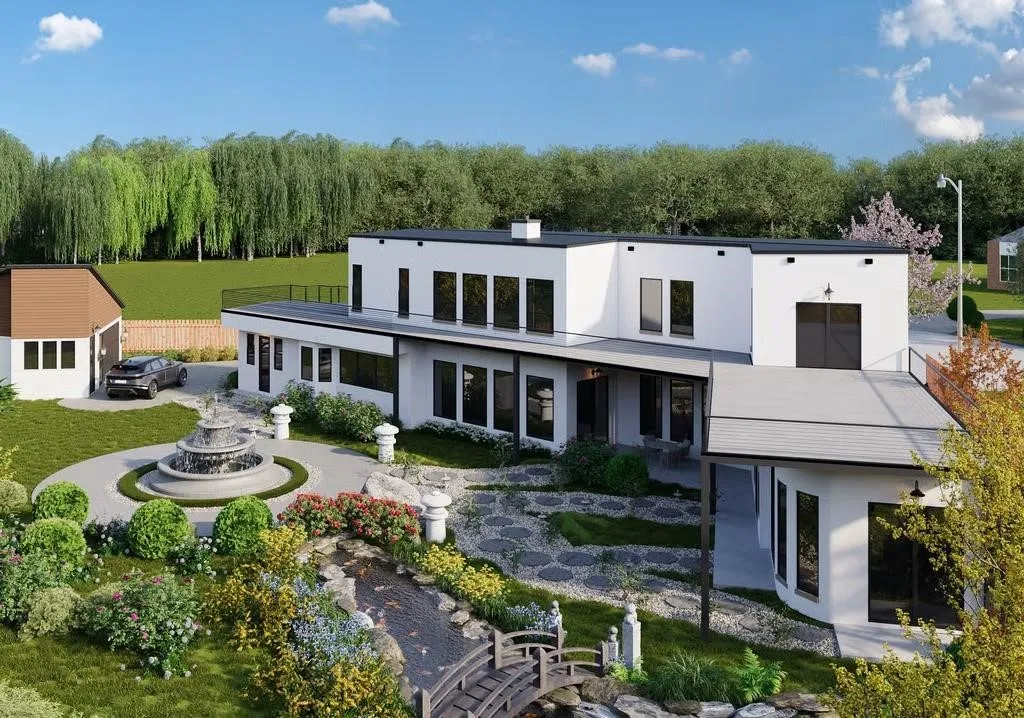 Modern architectural exterior with a flat roofline, extensive landscaping, a multi-tiered fountain, a decorative pond with a footbridge, and a detached two-car garage