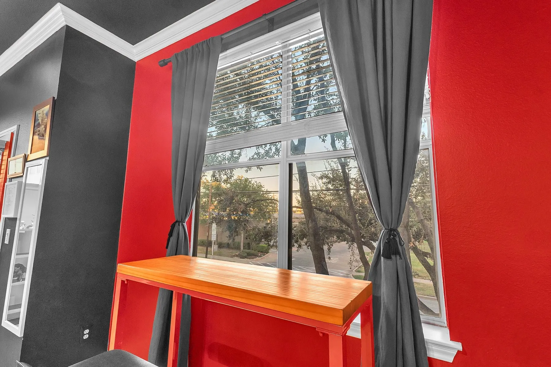 Sunny window nook with tree views, a great spot for a desk or coffee bar