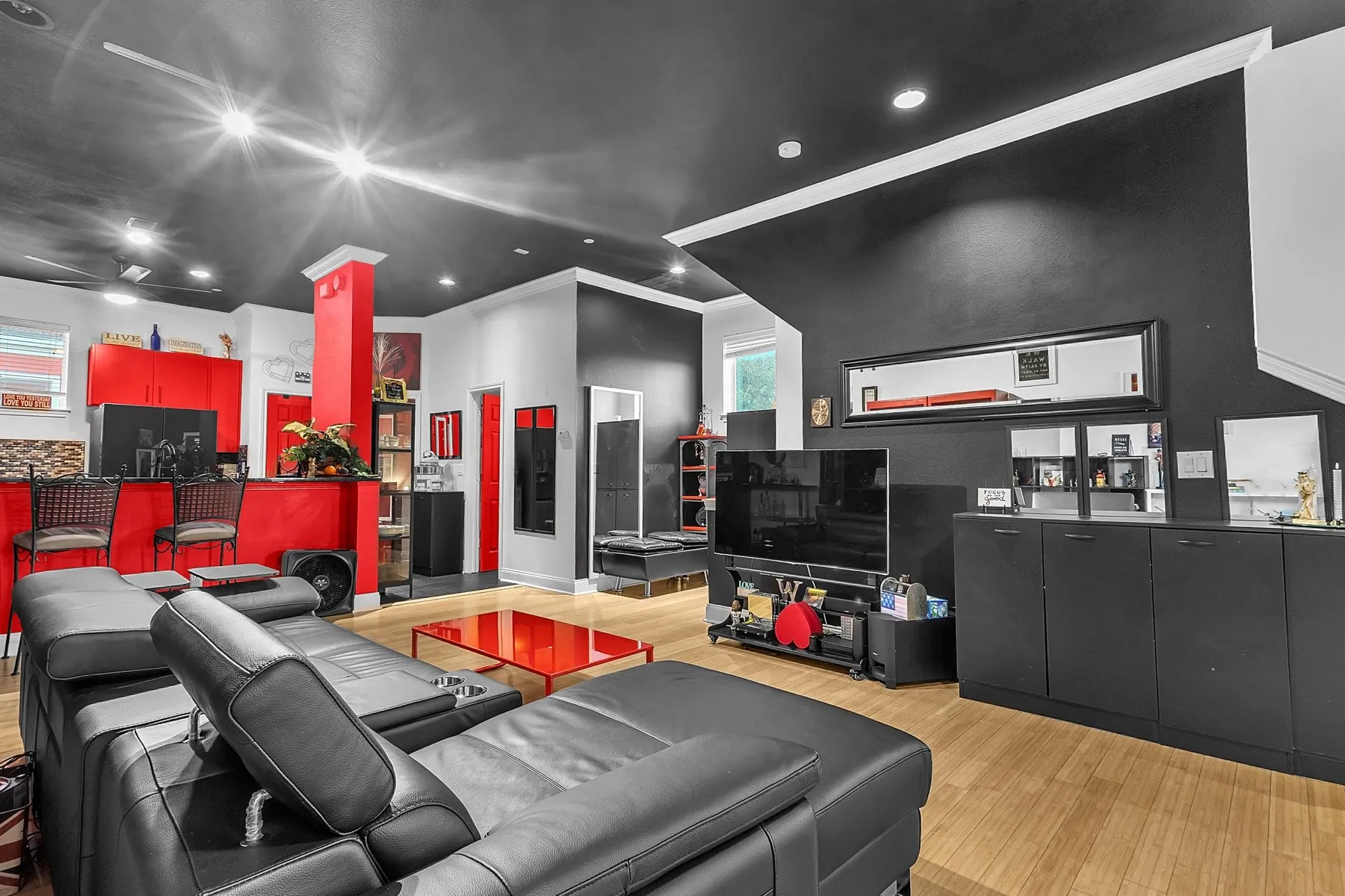 Living room with room for a large sectional and a full media wall