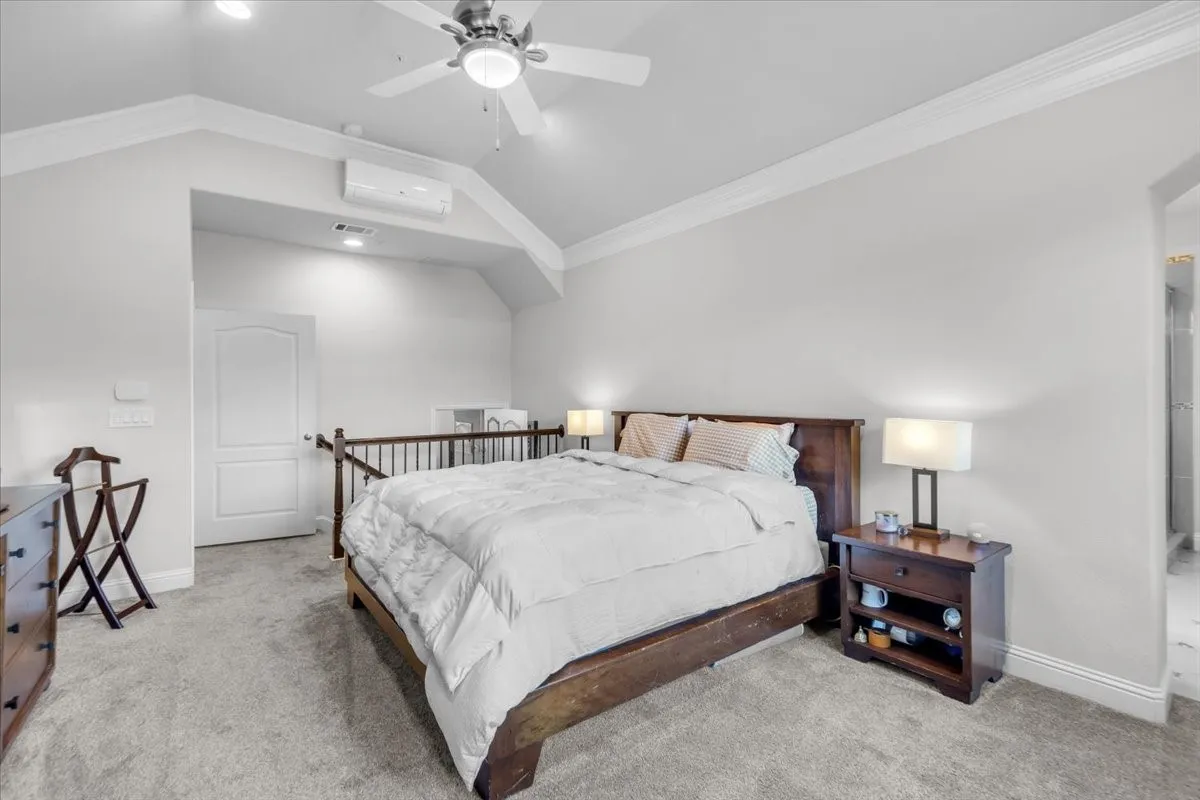Large primary bedroom and private retreat featuring an LG mini-split air conditioning system for extra comfort and convenience.